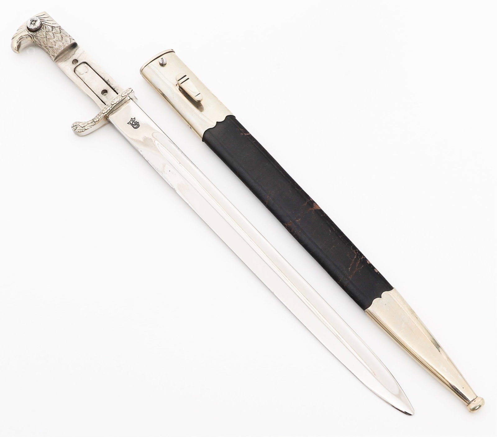 WWII GERMAN POLICE DRESS BAYONET by WKC: WWII GERMAN POLICE DRESS BAYONET by WKC WWII German Police Dress Bayonet. Single edged, bright blade with maker mark of WKC stamped on one side of the ricasso and Weyersberg Kirschbaum & Cie, Solingen