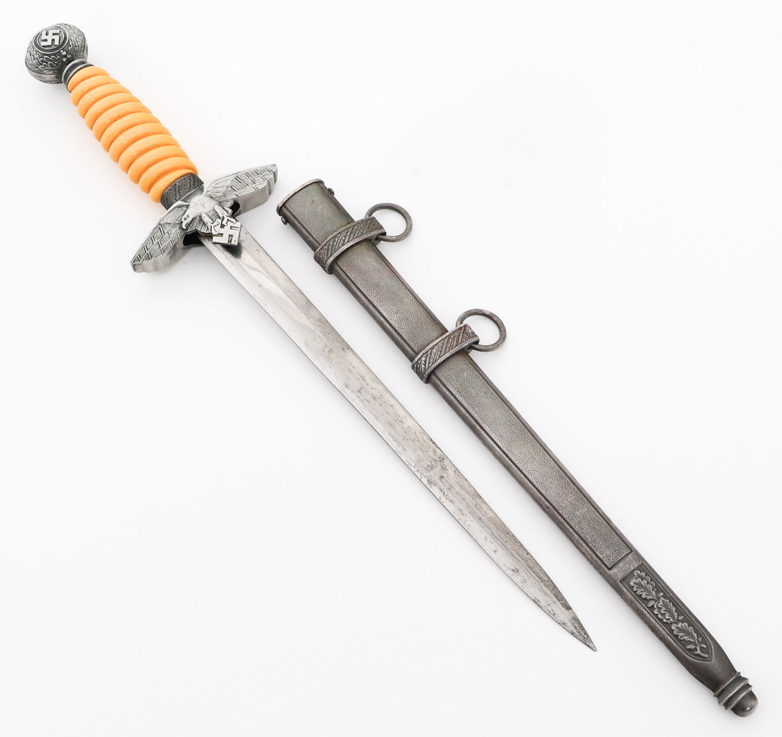 WWII GERMAN LUFTWAFFE 2nd MODEL DRESS DAGGER: WWII GERMAN LUFTWAFFE 2nd MODEL DRESS DAGGER WWII German Luftwaffe 2nd Model Officer Dress Dagger. Double edged, bright blade. No visible maker marks or stamps visible. Alloy hilt with steel ferrule.