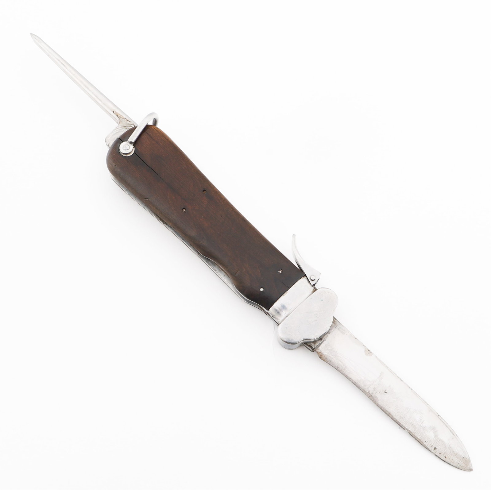 WWII GERMAN PARATROOPER NON-TAKEDOWN GRAVITY KNIFE: WWII GERMAN PARATROOPER NON-TAKEDOWN GRAVITY KNIFE WWII German Paratrooper Non-Takedown Gravity Knife. Single edged, stainless steel blade. Maker mark of F&A Helbig and "Rostfrei" etched on the blade.