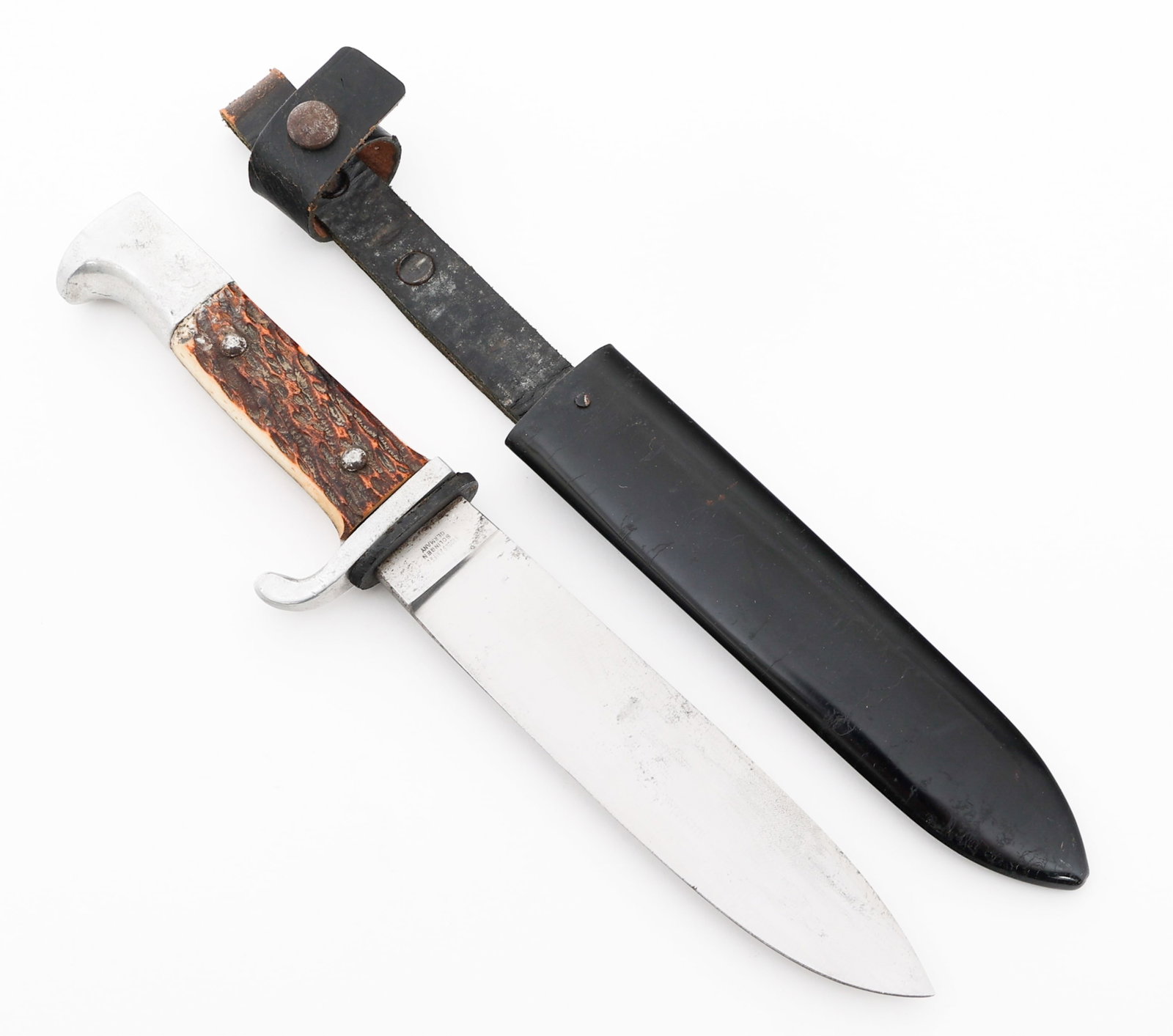 POST WWII GERMAN HUNTING KNIFE by BROOKS KNIFE CO: POST WWII GERMAN HUNTING KNIFE by BROOKS KNIFE CO Post WWII German Hunting Knife. Single edged, bright blade. Maker marked by Brooks Knife Co and K. Ritter on the ricasso. Leather buffer pad present. 