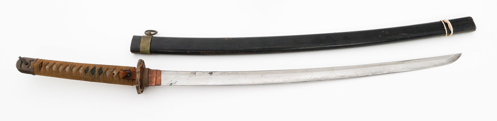 WWII IMPERIAL JAPANESE OFFICER TYPE 98 SHIN GUNTO: WWII IMPERIAL JAPANESE OFFICER TYPE 98 SHIN GUNTO WWII Imperial Japanese Army Officer Type 98 Shin Gunto Sword. Single edged, slightly curved, bright blade with no visible Hamon. Decorated copper Haba