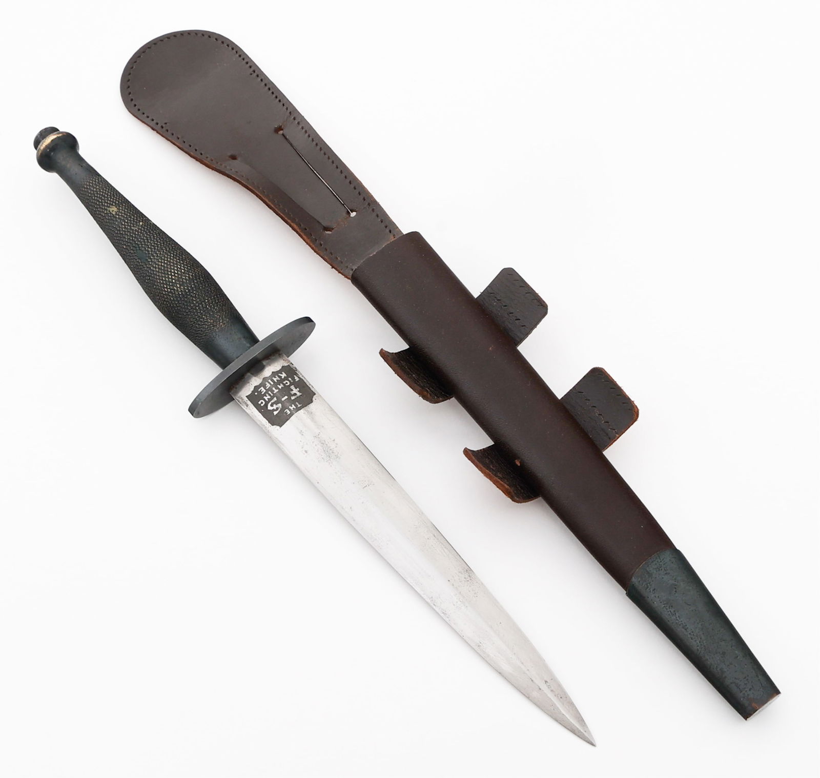 WWII FAIRBAIRN SYKES FIGHTING KNIFE by WILKINSON: WWII FAIRBAIRN SYKES FIGHTING KNIFE by WILKINSON WWII Fairbairn Sykes 2nd Pattern Fighting Knife by Wilkinson. Double edged, bright stiletto blade. Maker mark of Wilkinson Sword Co etched on the ricas