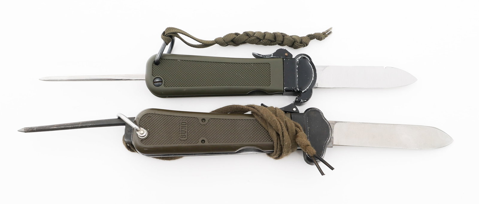 COLD WAR WEST GERMAN GRAVITY KNIVES by EICKHORN: COLD WAR WEST GERMAN GRAVITY KNIVES by EICKHORN Cold War West German Paratrooper Gravity Knives. (2) Gravity Knife. Maker mark of Carl Eickhorn etched on the blade. Plastic grips with marlin spike and