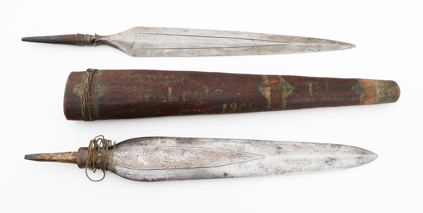 AFRICAN TRIBAL LANCE DAGGER BLADES: AFRICAN TRIBAL LANCE DAGGER BLADES African Tribal Lance Dagger Blades. (2) Dagger Blades. One includes wooden scabbard. Blade Length: 13 1/2" to 14 1/2" Total Length: 17 7/8" to 19"