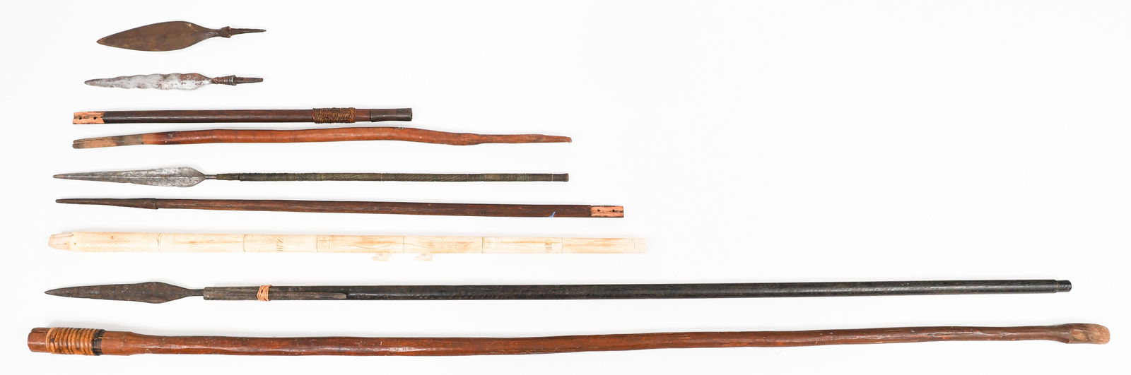 SOUTHEAST ASIAN & AFRICAN SPEARS & SPEAR HEADS: SOUTHEAST ASIAN & AFRICAN SPEARS & SPEAR HEADS Southeast Asian and African Spears and Spear Heads. Steel blades and wooden shafts. Blade Length: 9" to 10 1/2" Total Length: 23 3/4" to 72"