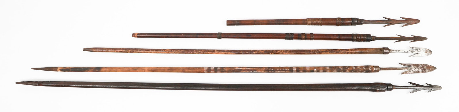 SOUTHEAST ASIAN HUNTING & FISHING SPEARS: SOUTHEAST ASIAN HUNTING & FISHING SPEARS Southeast Asian Hunting and Fishing Spears. Steel heads with wooden shafts. Blade Length: 7" to 9" Total Length: 33" to 66 1/2"