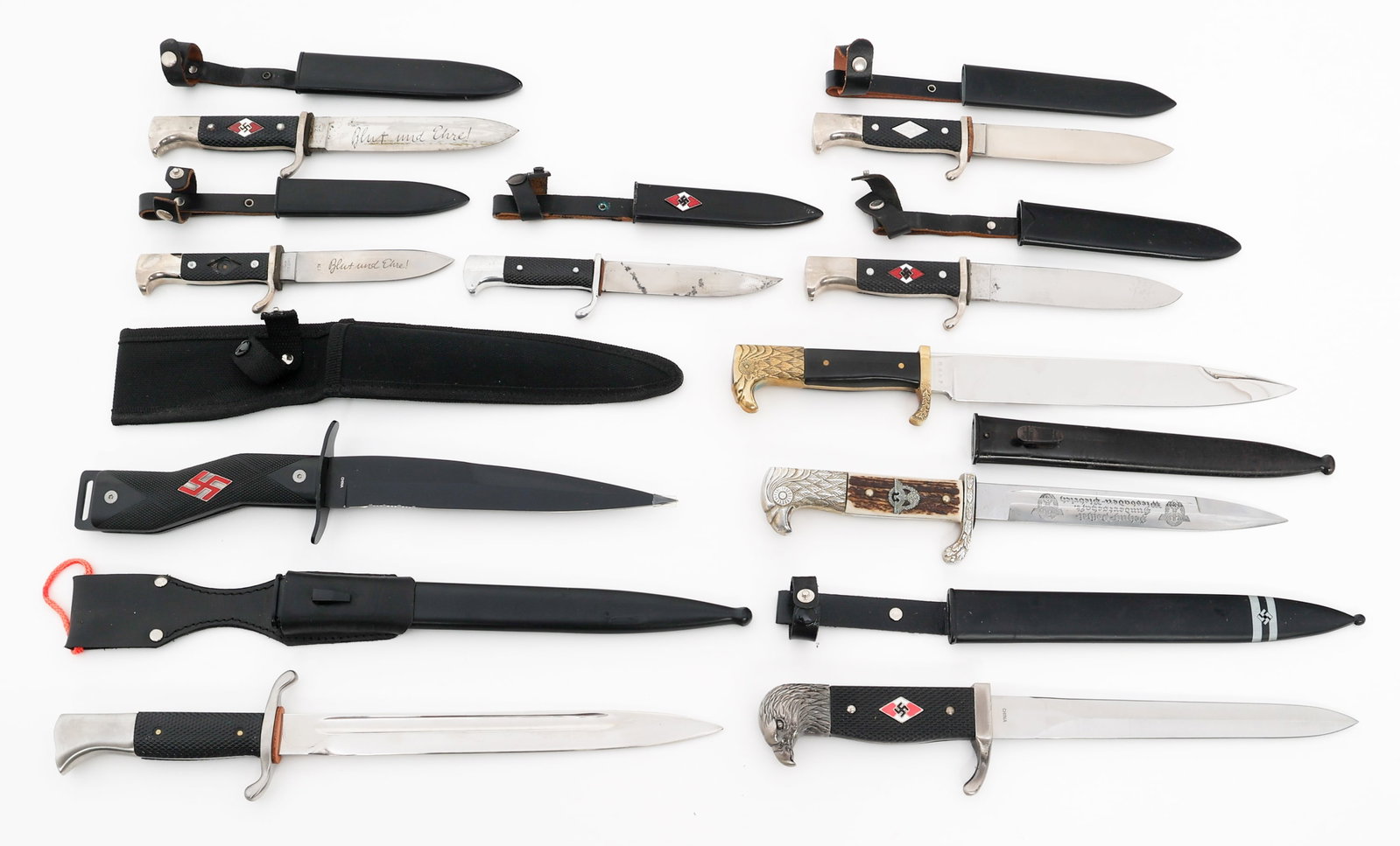 MODERN COPIES OF WWII GERMAN KNIVES & BAYONETS: MODERN COPIES OF WWII GERMAN KNIVES & BAYONETS Modern Copies of WWII German Knives and Bayonets. Blade Length: 4 3/8" to 10" Total Length: 8" to 15: Provenance: Lifetime Edged Weapon & Military Memora