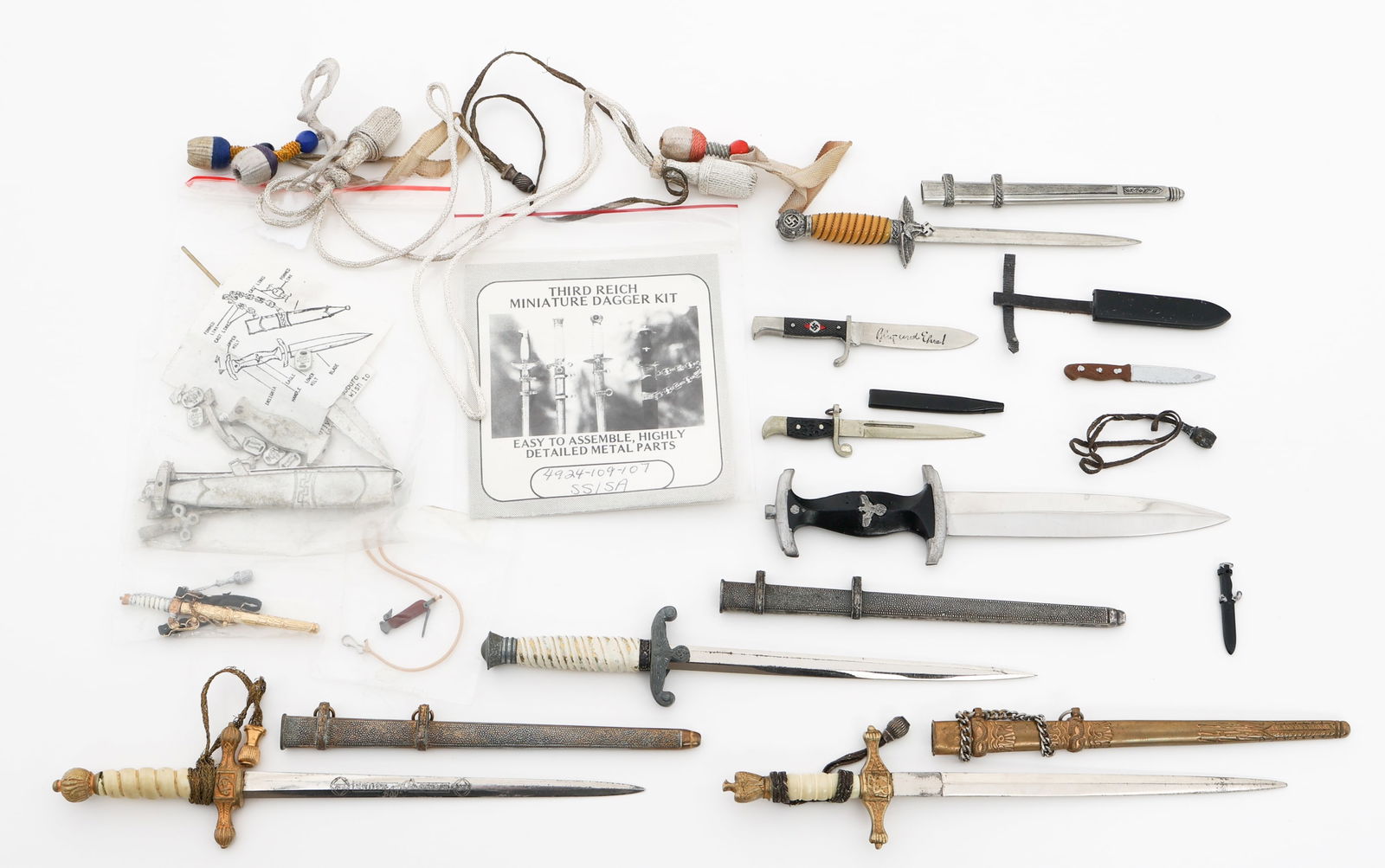 MODERN MINIATURE COPY WWII GERMAN DAGGERS & TOYS: MODERN MINIATURE COPY WWII GERMAN DAGGERS & TOYS Modern Miniature Copies of WWII German Daggers and Toys. Including Hitler Youth, SS, Kriegsmarine, Luftwaffe, SS DIY dagger kit, Paratrooper and more.