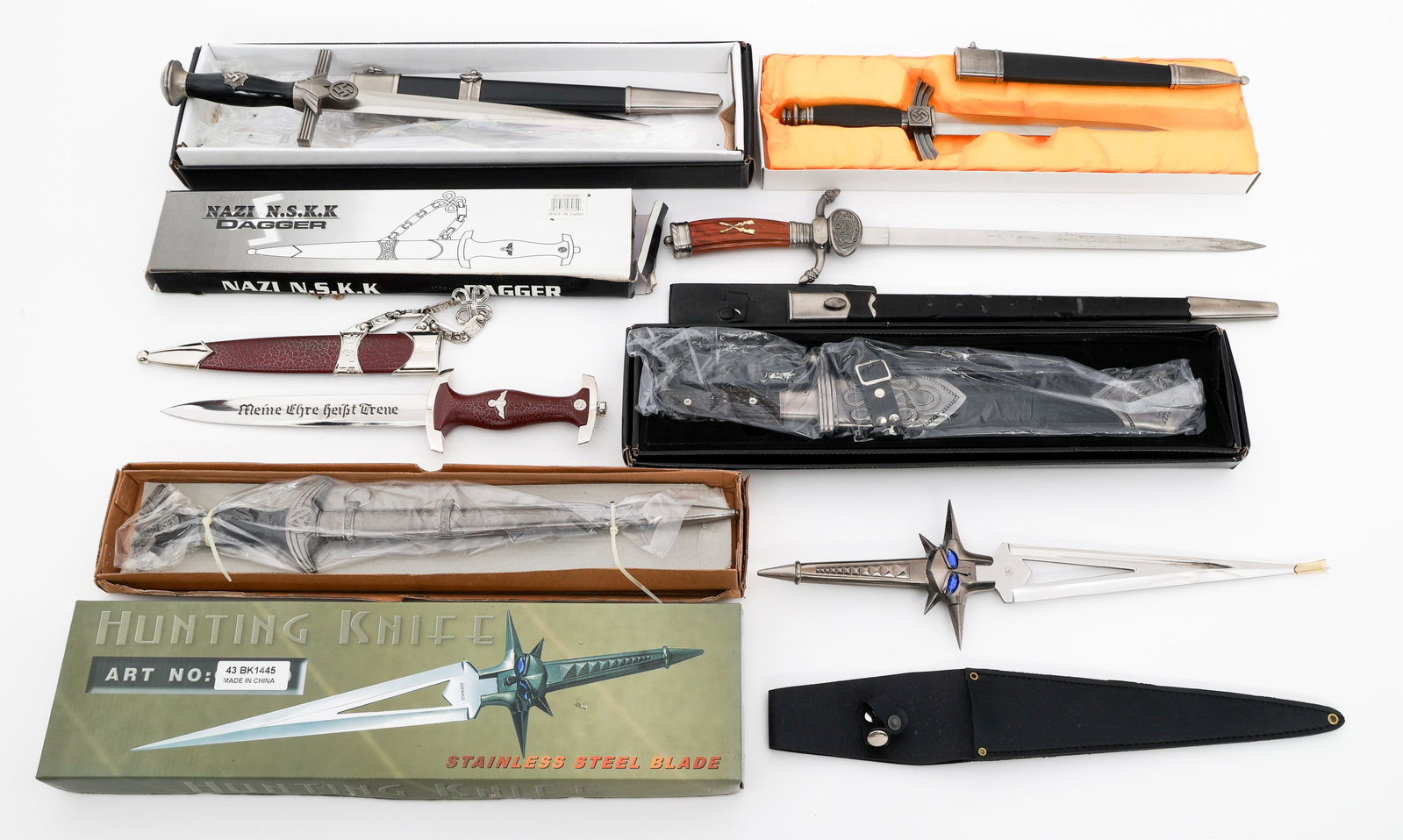 MODERN COPIES OF WWII GERMAN DRESS DAGGERS: MODERN COPIES OF WWII GERMAN DRESS DAGGERS Modern Copies of WWII German Dress Daggers. Includes NSKK, RAD, Luftwaffe, RLB, and more. Some are sealed in packaging. Blade Length: 8 1/2" to 14 1/2" Total