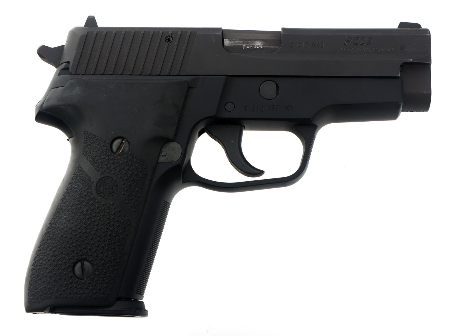SIG SAUER MODEL P228 9x19mm CALIBER PISTOL: SIG SAUER MODEL P228 9x19mm CALIBER PISTOL Sig Sauer Model P228 9x19mm caliber semi automatic pistol. KE date code. Fixed sights. Hogue rubber grips. Original Sig grips. Two magazines. SigArms hard ca