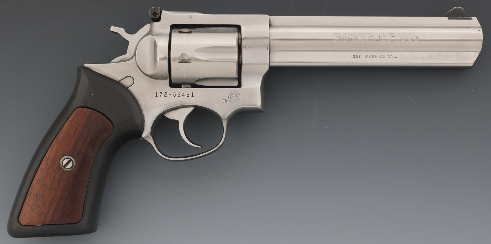RUGER MODEL GP100 .357 MAGNUM CALIBER REVOLVER: RUGER MODEL GP100 .357 MAGNUM CALIBER REVOLVER Ruger Model GP100 .357 Magnum caliber DA revolver. Six-shot fluted cylinder. Rubber grips with synthetic wood inserts. Blade front sight. Adjustable rear