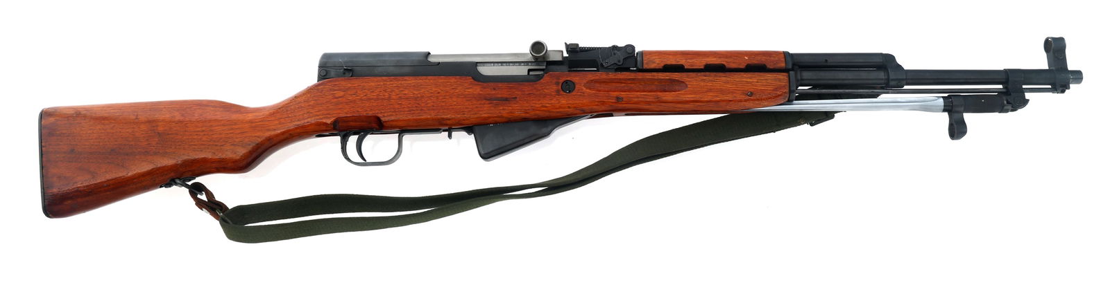 CHINESE NORINCO MODEL TYPE 56 7.62x39mm SKS RIFLE: CHINESE NORINCO MODEL TYPE 56 7.62x39mm SKS RIFLE Chinese Norinco Model Type 56 7.62x39mm caliber semi-automatic SKS rifle. CAI import mark. 90 serial prefix. Wood stock. Steel butt plate. Compartment