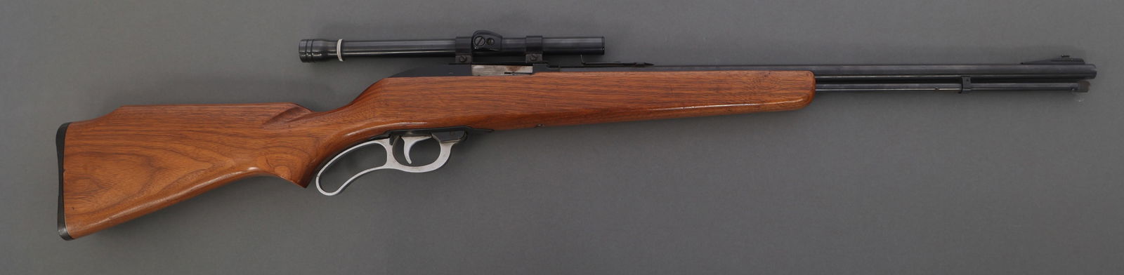 J.C. HIGGINS MODEL 44DL .22 CALIBER RIFLE: J.C. HIGGINS MODEL 44DL .22 CALIBER RIFLE J.C. Higgins Model 44DL .22 S-L-LR caliber lever action rifle. Blued finish. Blade front sight. Adjustable rear sight. J.C. Higgins 4x scope with cross hair r