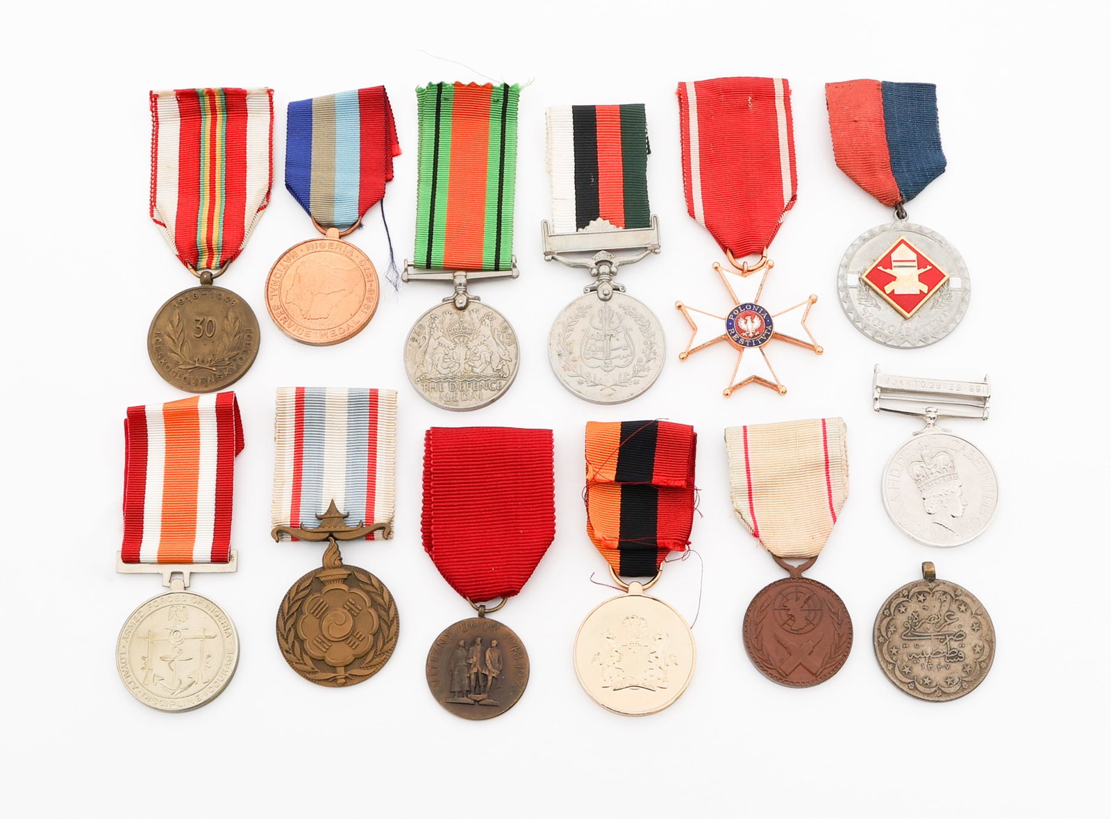 WWII - COLD WAR WORLD SERVICE & DEFENSE MEDALS: WWII - COLD WAR WORLD SERVICE & DEFENSE MEDALS WWII - Cold War World Military Service and Defense Medals. Includes Order of Polonia Restituta, Nigerian Defense, French Operations in Korea, Korean War 