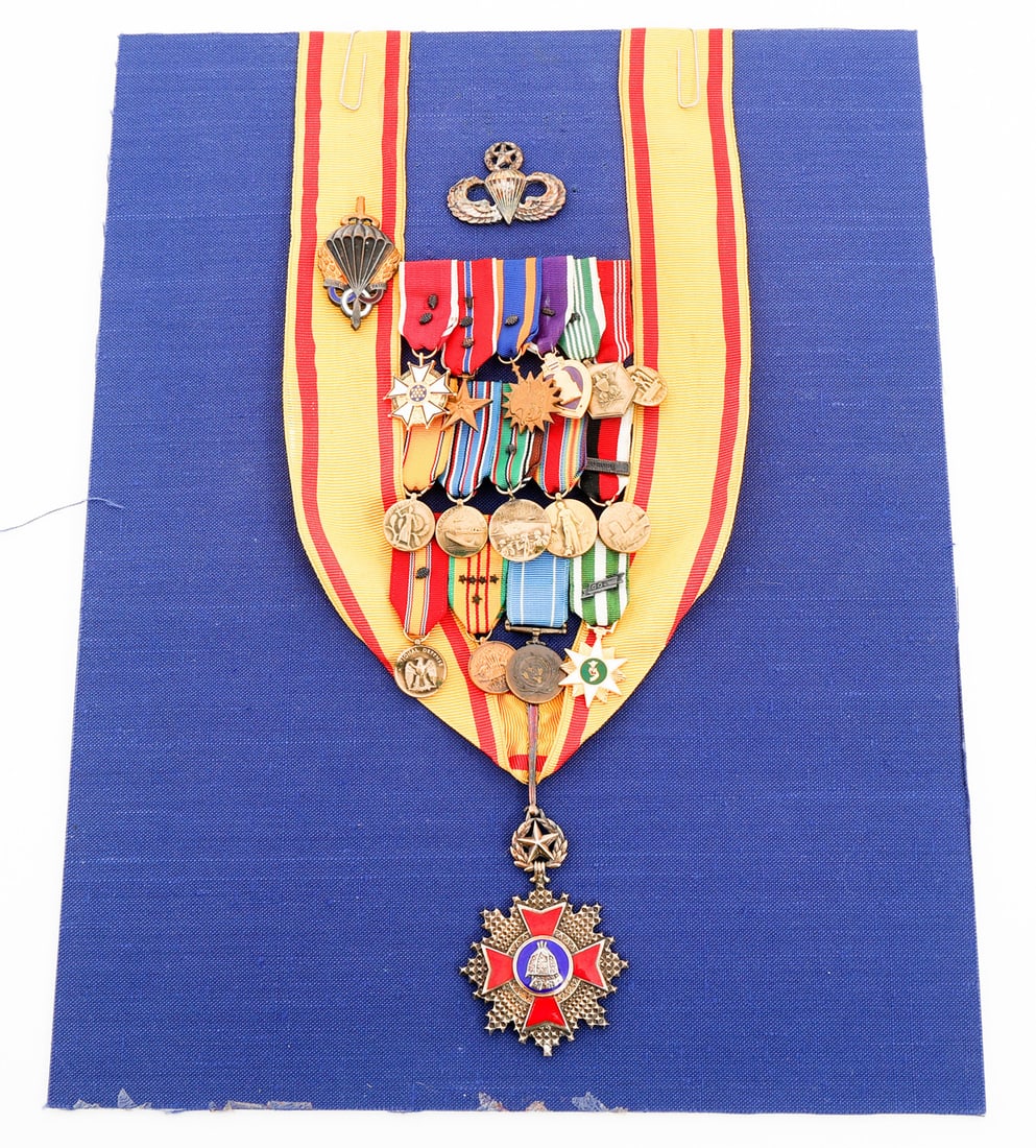 WWI - VIETNAM WAR US VETERAN MEDALS: WWI - VIETNAM WAR US VETERAN MEDALS Framed WWII - Vietnam War US Veteran Medals. (1) Korean Order of Military Merit 5th Class full sized medal. (1) Master Jump wings. (1) French Paratrooper Military P