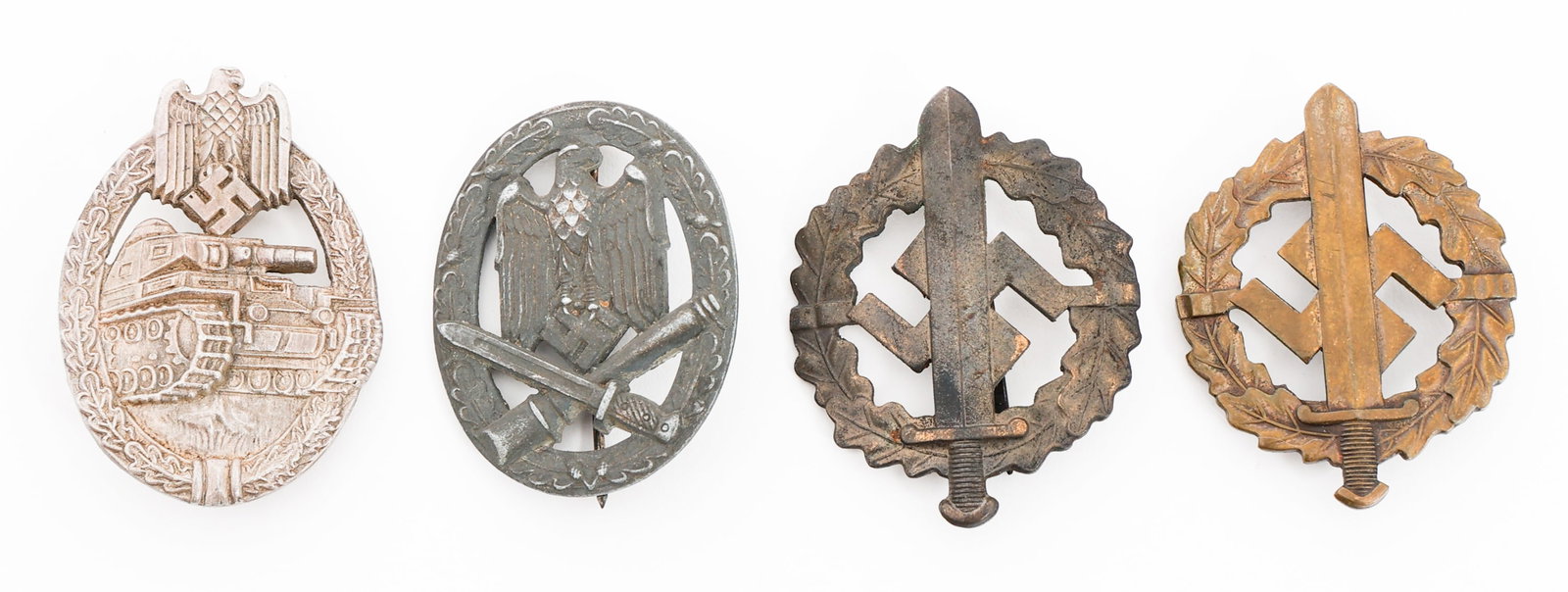 WWII GERMAN HEER & SA BADGES: WWII GERMAN HEER & SA BADGES WWII German Heer and SA Badges. (1) Panzer Assault Badge in Silver. Marked "R.R.S." on the reverse. (1) General Assault Badge. (2) SA Sports Badge.