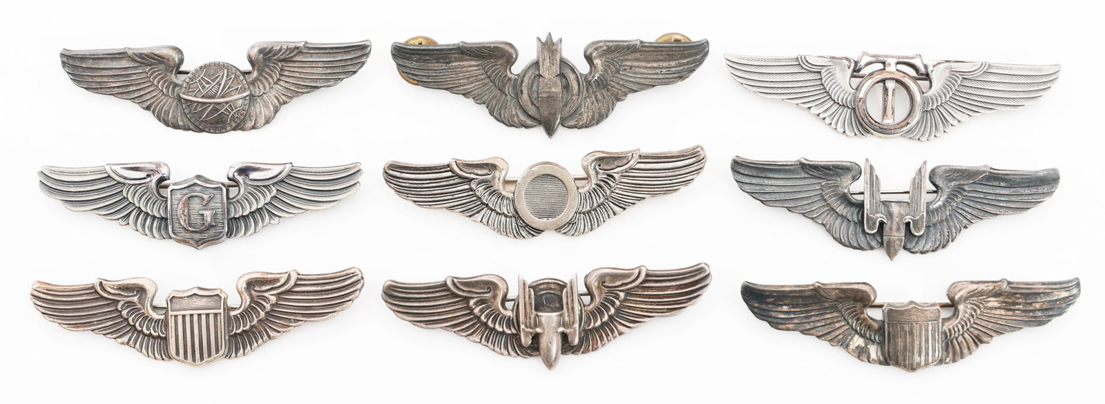 WWII - KOREAN WAR US 3" AVIATOR WINGS: WWII - KOREAN WAR US 3" AVIATOR WINGS WWII - Korean War US 3" Aviator Wings. Includes Technical Observer, Glider Pilot, Navigator, Combat Pilot and Pilot. Makers include N.S. Meyer and LGB. Majority a