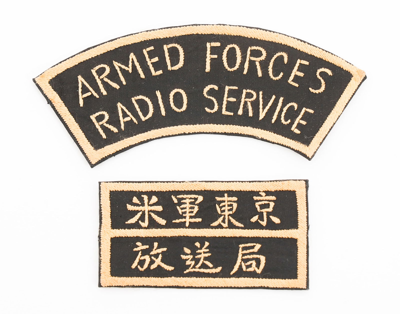 WWII OCCUPATION ARMED FORCES RADIO SERVICE PATCHES: WWII OCCUPATION ARMED FORCES RADIO SERVICE PATCHES WWII Post-War Occupation US Armed Forces Radio Service Japanese Made Patches. Assigned to Radio Tokyo. Silk on twill embroidery. Size: 1 1/4" x 2 3/8