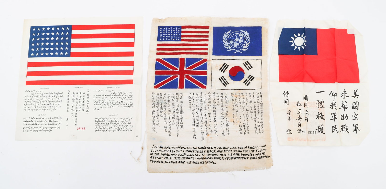 WWII - COLD WAR US & UN AVIATOR BLOOD CHITS: WWII - COLD WAR US & UN AVIATOR BLOOD CHITS WWII - Cold War US and United Nations Aviator Blood Chits. (1) CBI Theater. Waterproof cloth construction. (1) Korean War with US, UK, South Korean and UN f