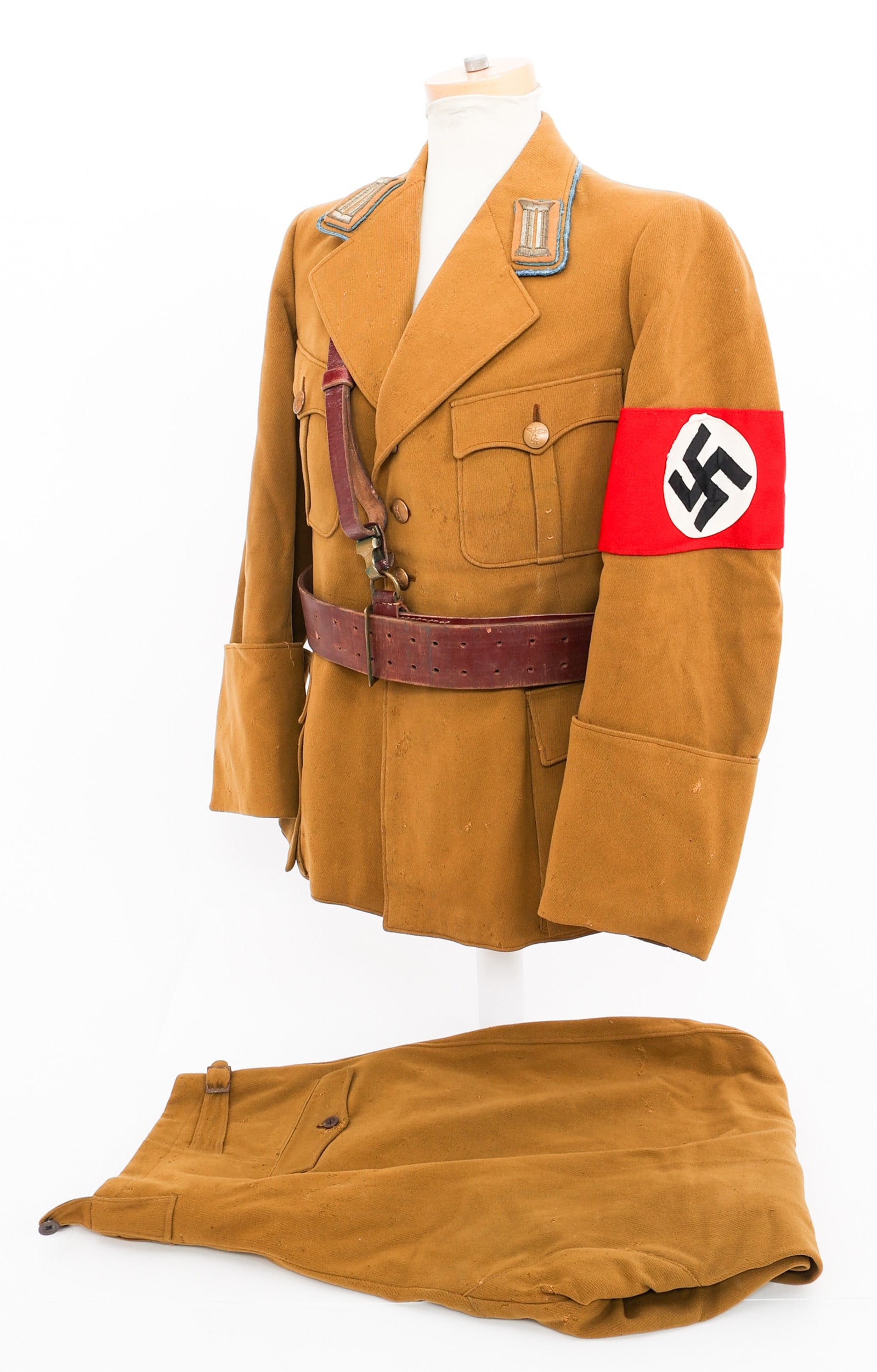 WWII GERMAN ORTSGRUPPE AMTSLEITER NSDAP UNIFORM: WWII GERMAN ORTSGRUPPE AMTSLEITER NSDAP UNIFORM WWII German Ortsgruppe Amtsleiter NSDAP Uniform. Standard four pocket, fine quality wool tunic with blue piping, collar tabs and stitched armband. Tailo