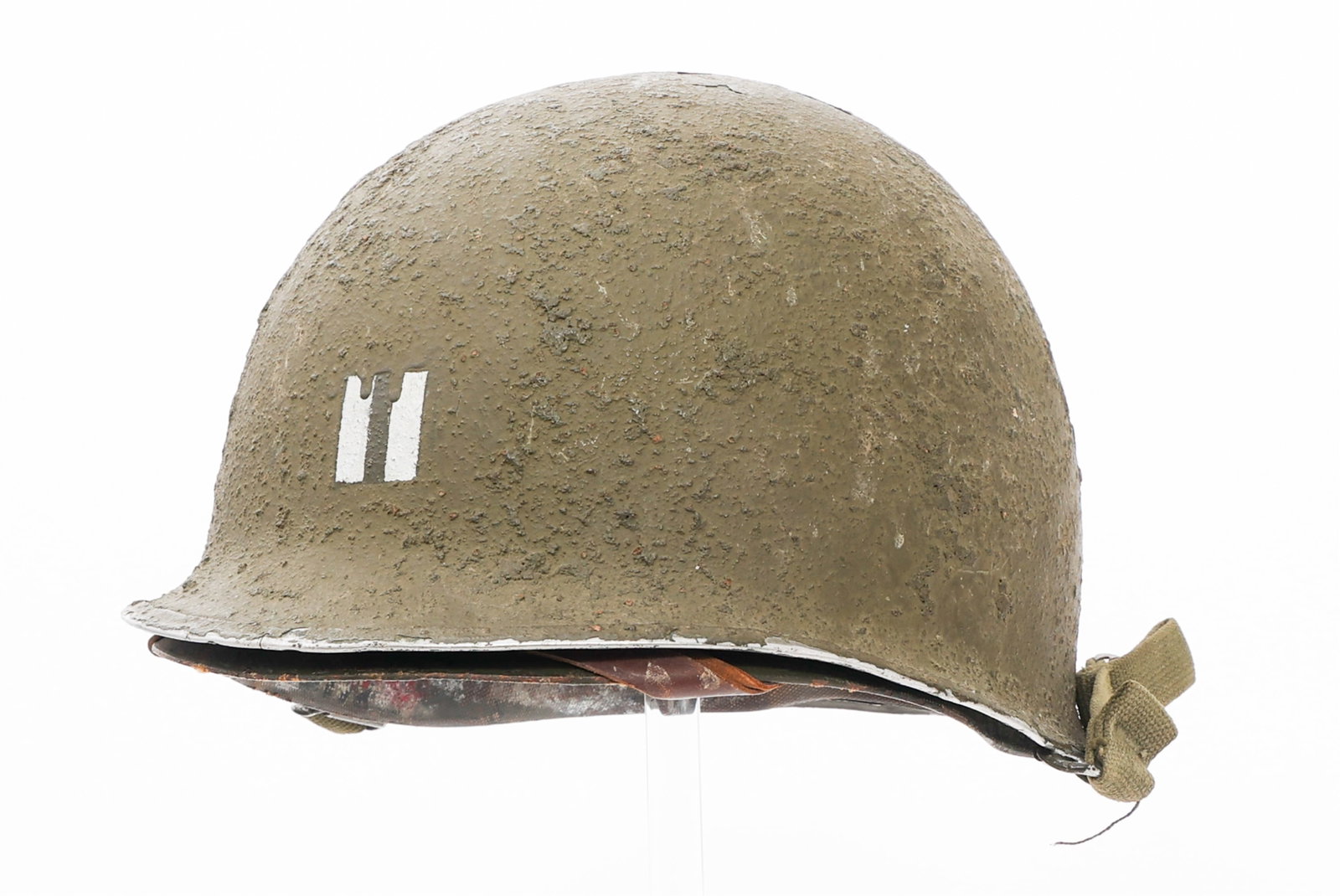 WWII - KOREA US ARMY NAMED CAPT M1 COMBAT HELMET: WWII - KOREA US ARMY NAMED CAPT M1 COMBAT HELMET WWII - Korean War US Army Captain's M1 Combat Helmet. Named to Captain Robert B. Burton, O-418443. Front seam, swivel bale McCord production shell with