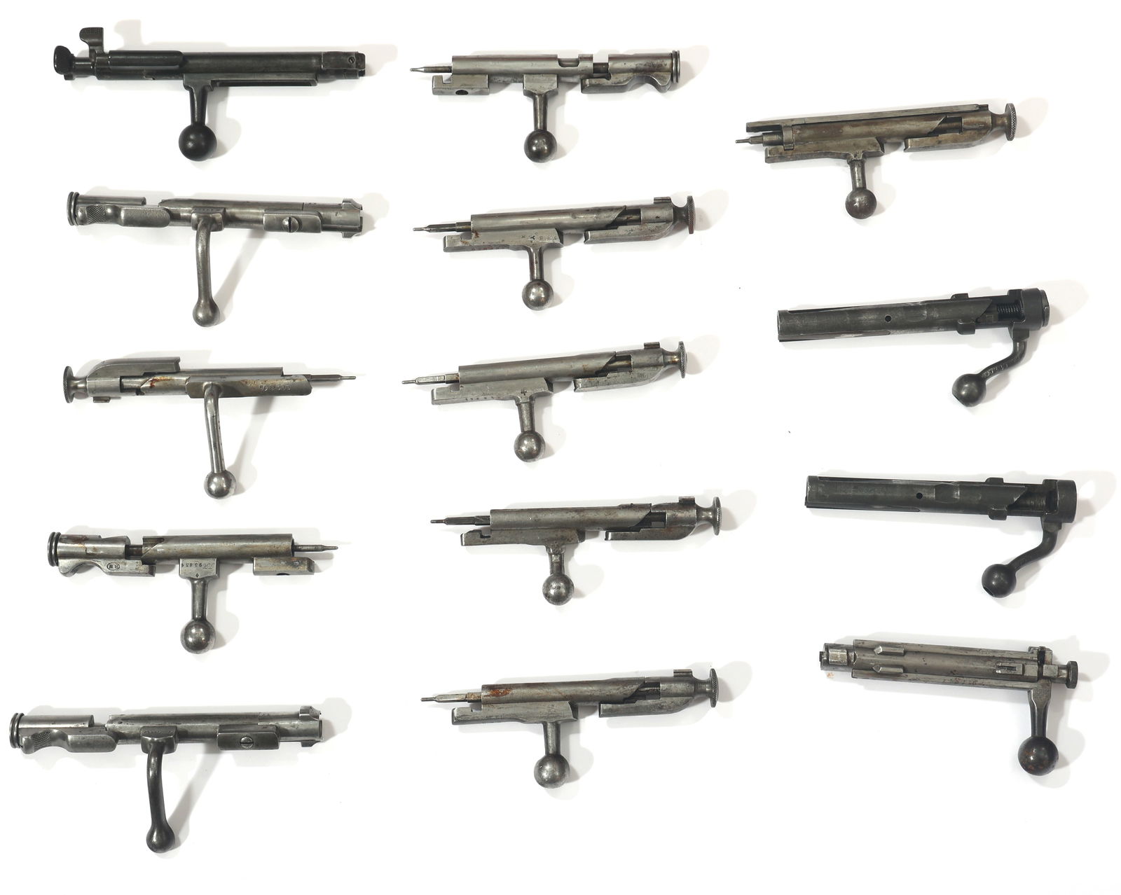 FRENCH MAS, LEBEL AND RUSSIAN 91/30 RIFLE BOLTS: FRENCH MAS, LEBEL AND RUSSIAN 91/30 RIFLE BOLTS French MAS 36, Lebel rifles and Russian 91/30 Mosin Nagant rifle bolts.