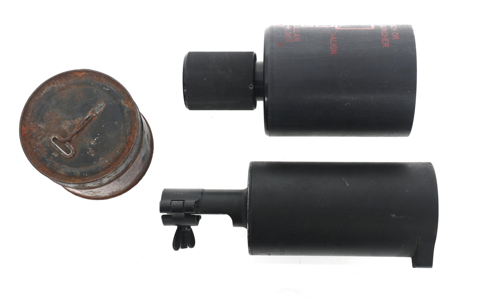 TEAR GAS REVOLVER LAUNCHERS & SIGNAL LIGHTS: TEAR GAS REVOLVER LAUNCHERS & SIGNAL LIGHTS Two Smith & Wesson Lake Erie Chemical revolver tear gas grenade launcher cups. One sealed tin of WWII US Signal Lights, Mk II, Very Red Star.