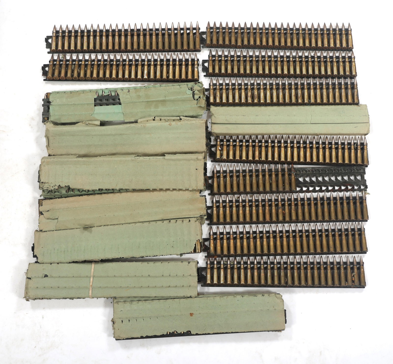 HOTCHKISS AMMO M1914 8mm CALIBER LEBEL 48 LBS TGW: HOTCHKISS AMMO M1914 8mm CALIBER LEBEL 48 LBS TGW Hotchkiss M1914 Machine Gun Ammunition 48 pounds total gross weight. Twenty-four round metal clip of French 8mm caliber Lebel ammunition with "SF 1 48