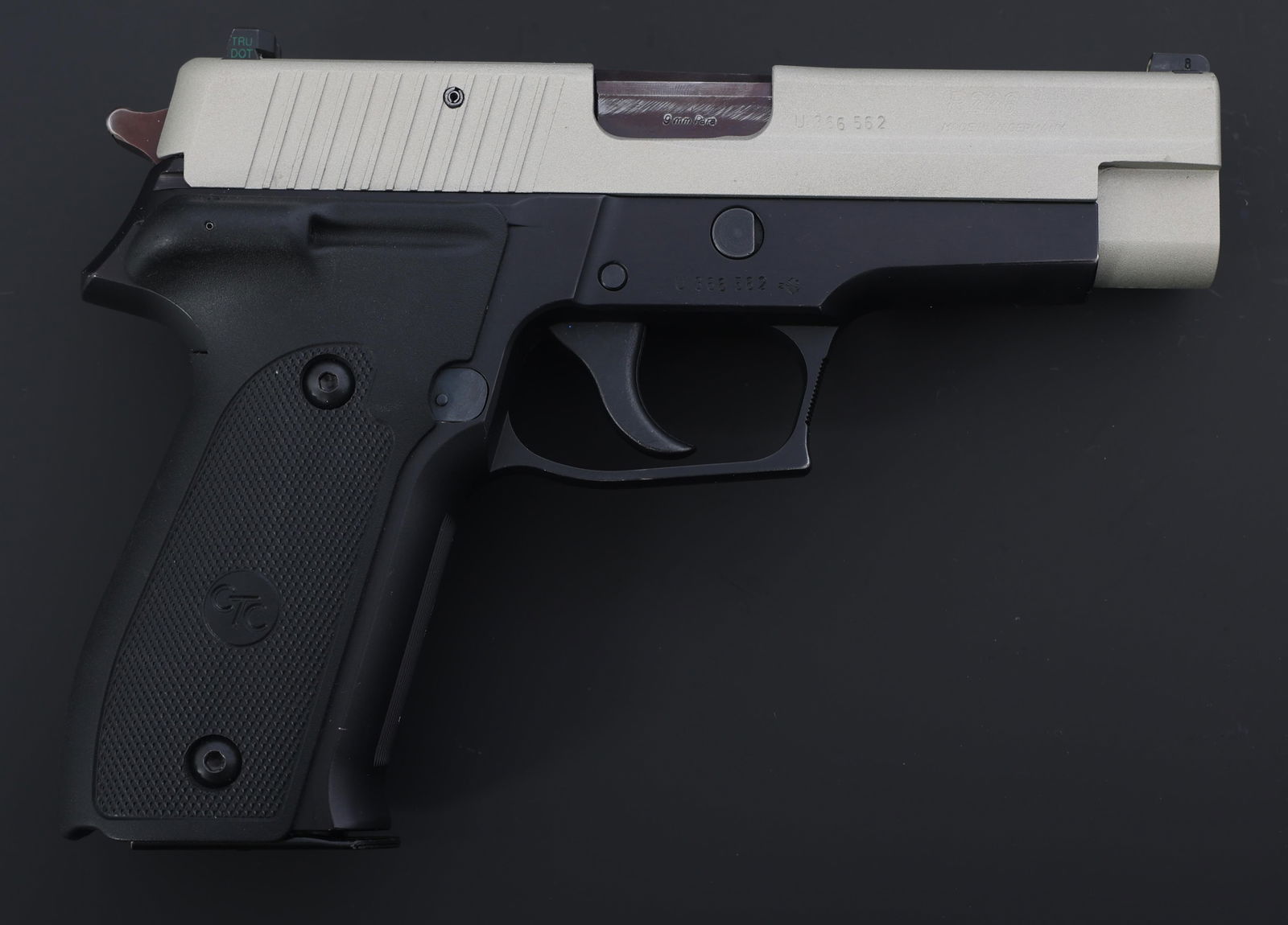 SIG SAUER MODEL P226 9x19mm CALIBER PISTOL: SIG SAUER MODEL P226 9x19mm CALIBER PISTOL Sig Sauer Model P226 9x19mm caliber semi automatic pistol. Made in Germany. JJ date code. Two tone finish. Three dot night sights. Crimson trace laser grip.