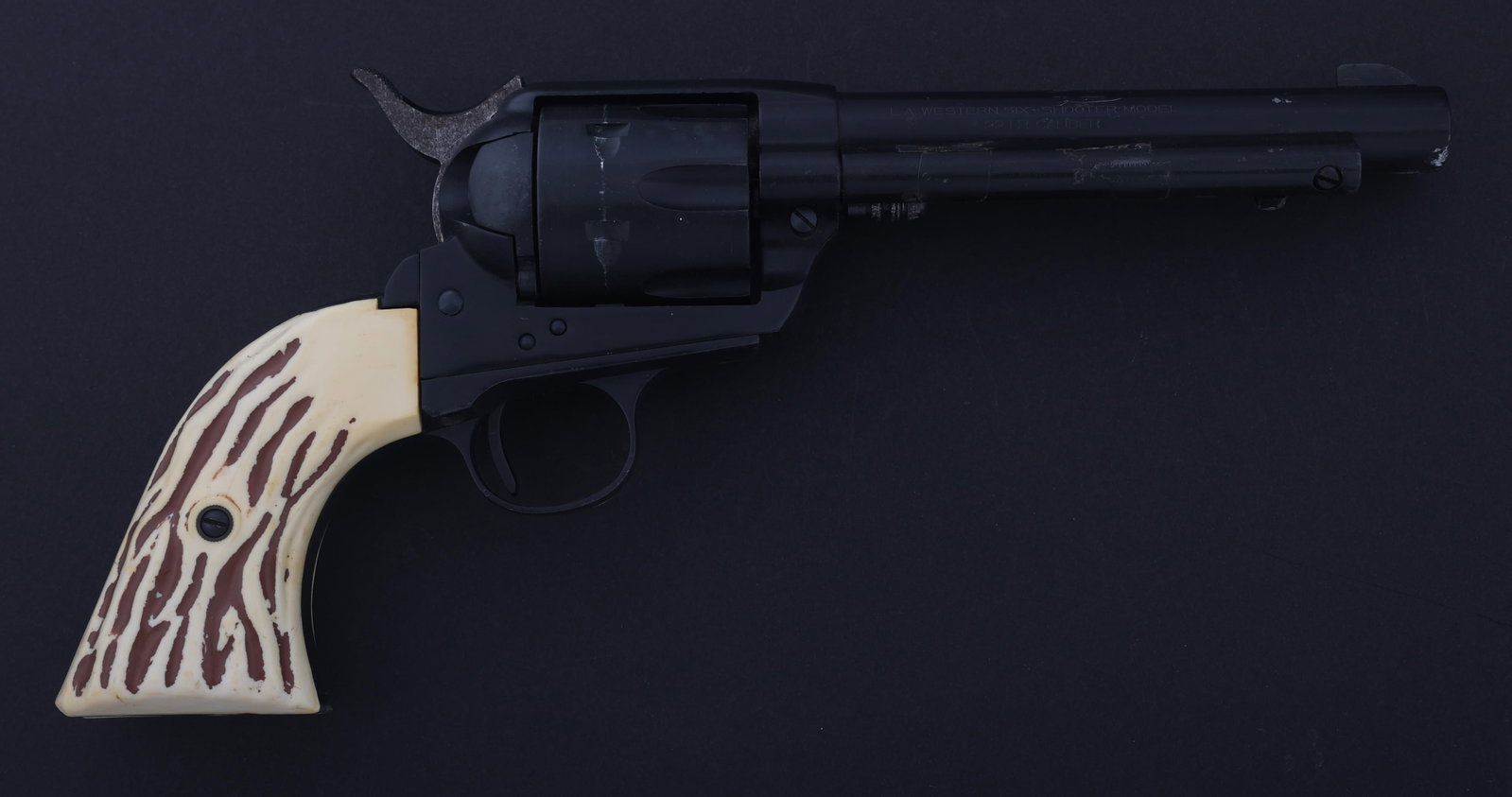 JP SAUER & SOHN LA WESTERN SIX-SHOOTER REVOLVER: JP SAUER & SOHN LA WESTERN SIX-SHOOTER REVOLVER JP Sauer & Sohn Model L.A. Western Six-Shooter .22 LR caliber SA revolver. Six-shot fluted cylinder. Composite grips. Fixed sights. Caliber / Gauge: 22 