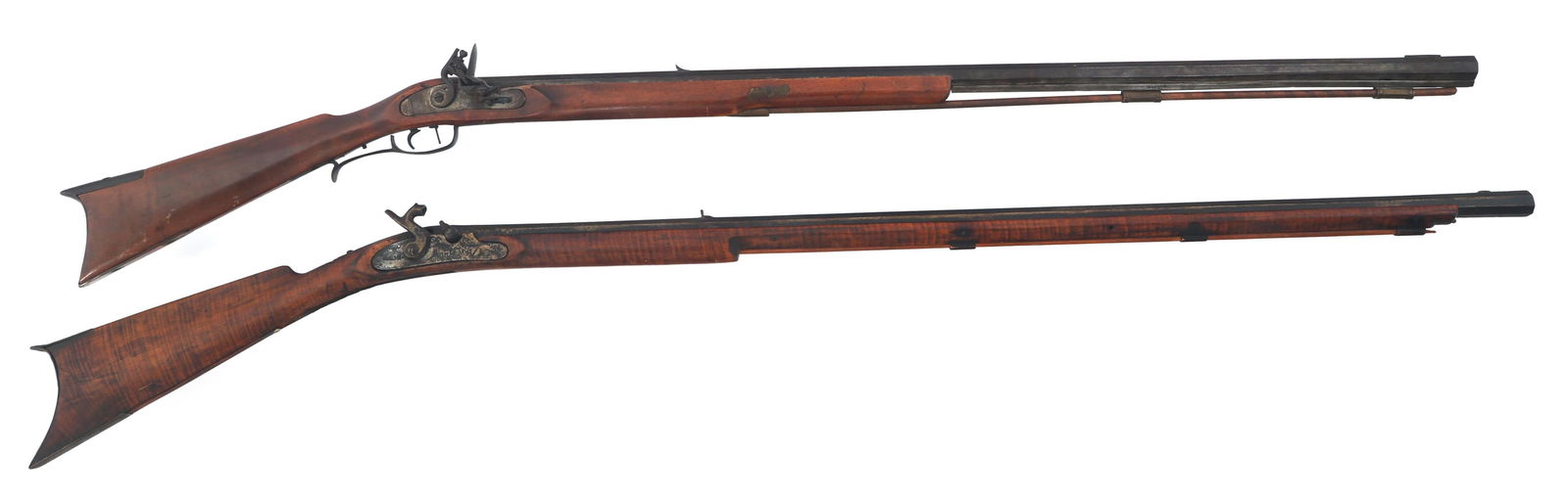 MODERN BLACK POWDER AMERICAN LONG RIFLES: MODERN BLACK POWDER AMERICAN LONG RIFLES Modern Black Powder American Long rifles. (A) Half stock. 38" octagonal barrel. Flintlock mechanism in side plate. Double trigger. Wood stock. Ramrod. (B) Full