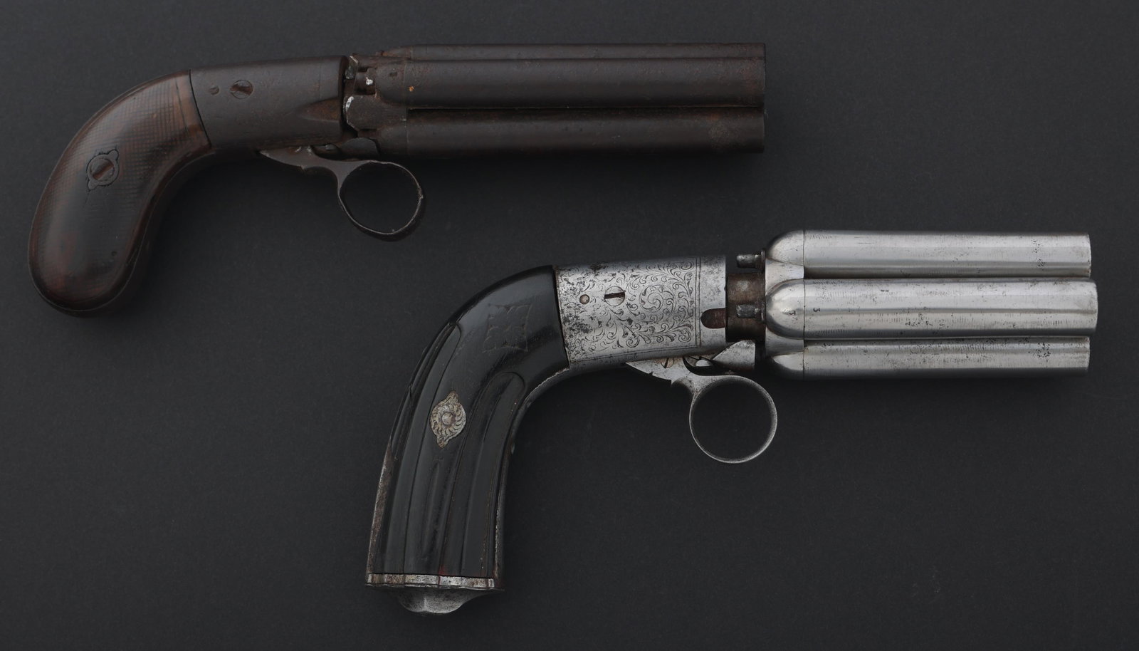 BELGIAN MARIETTE PEPPERBOX REVOLVERS FOR PARTS: BELGIAN MARIETTE PEPPERBOX REVOLVERS FOR PARTS Two Belgian Mariette four-barrel pepperbox revolvers for parts or repair. A) Belgian Mariette four-barrel pepperbox 12mm percussion revolver. Engraved fr