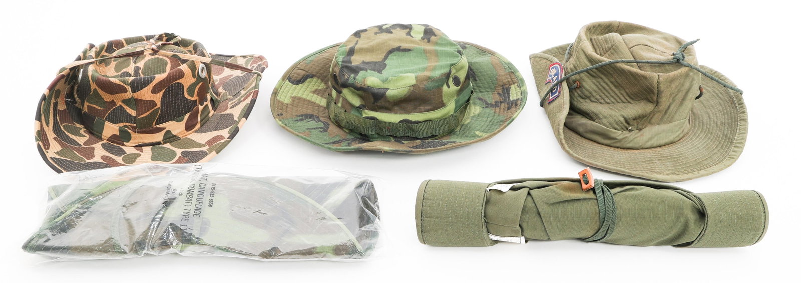 VIETNAM WAR US ARMY BUSH & JUNGLE BOONIE HATS: VIETNAM WAR US ARMY BUSH & JUNGLE BOONIE HATS Vietnam War US Army Bush and Jungle Boonie Hats. (1) Theater Made Bush Hat. OD green hat with "Thailand" tab. (1) Theater Made Bush Hat. Beo Gam camo hat 