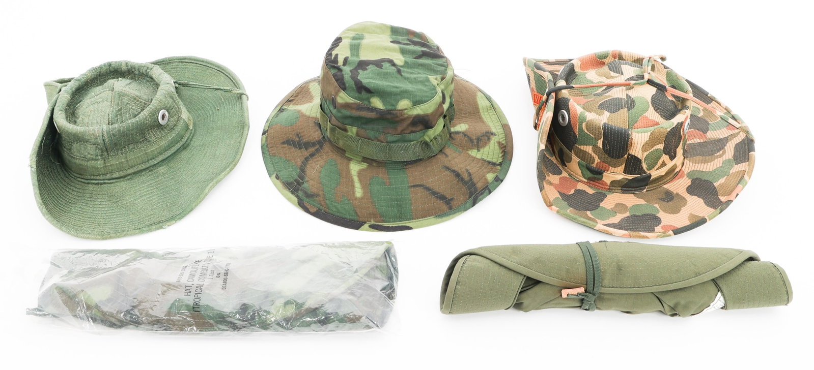 VIETNAM WAR US ARMY BUSH & JUNGLE BOONIE HATS: VIETNAM WAR US ARMY BUSH & JUNGLE BOONIE HATS Vietnam War US Army Bush and Jungle Boonie Hats. (1) Theater Made Bush Hat. OD green hat with "Vietnam" tab. (1) Theater Made Bush Hat. Beo Gam camo hat w