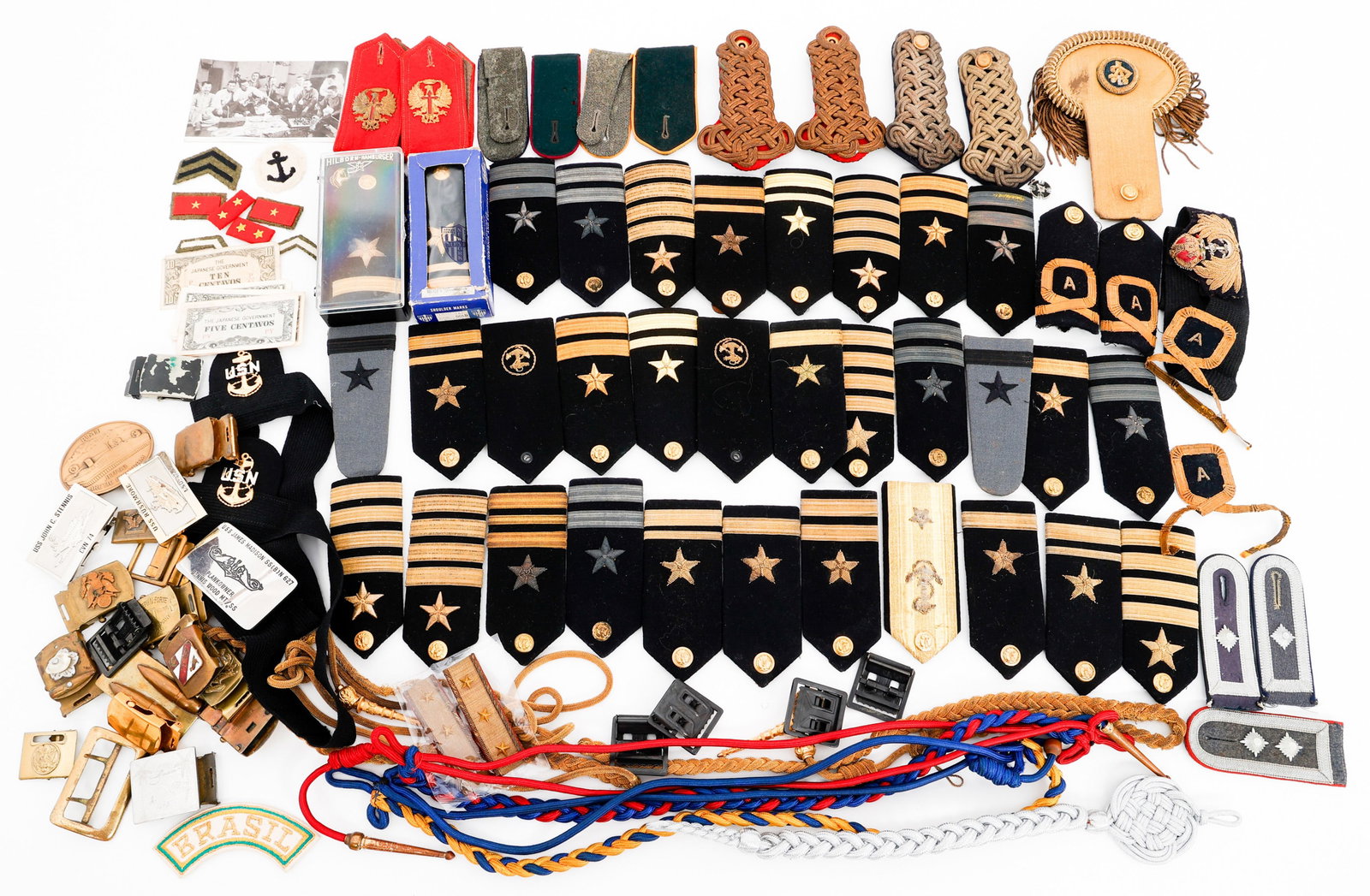 WWII - COLD WAR WORLD MILITARY INSIGNIA: WWII - COLD WAR WORLD MILITARY INSIGNIA WWII - Cold War US, German, Japanese and British Military Insignia. Includes Shoulder Boards, Shoulder Chords, Belt Buckles, Cap Badges, Epaulette, ranks, buckl