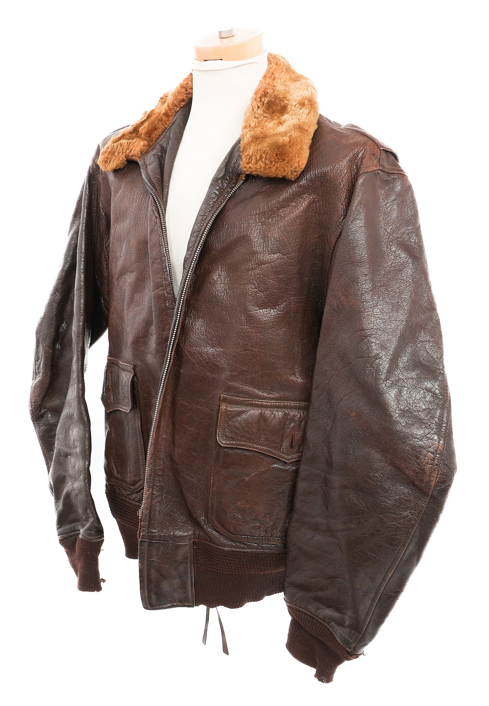 WWII US NAVY AN-J-3A LEATHER FLIGHT JACKET: WWII US NAVY AN-J-3A LEATHER FLIGHT JACKET WWII US Navy AN-J-3A Leather Flight Jacket. Leather construction with fur collar and wool cuffs & waistband. "USN" marked on the underside of collar. No visi