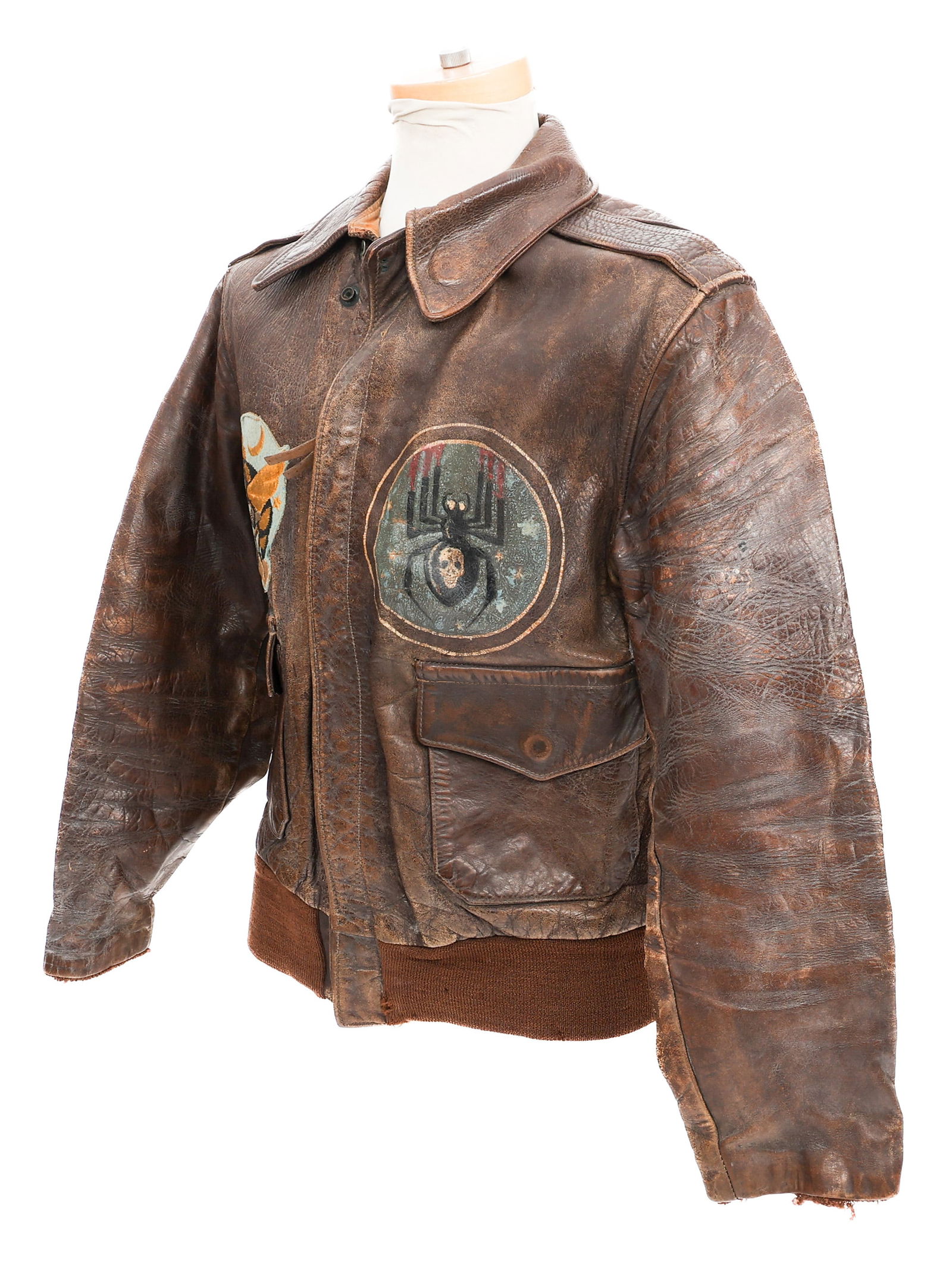WWII USAAF 418th NIGHT FIGHTER SQ TYPE A-2 JACKET: WWII USAAF 418th NIGHT FIGHTER SQ TYPE A-2 JACKET WWII USAAF 418th Night Fighter Squadron Type A-2 Leather Flight Jacket. Machine embroidered on felt squadron patch and painted Black Widow emblem on t