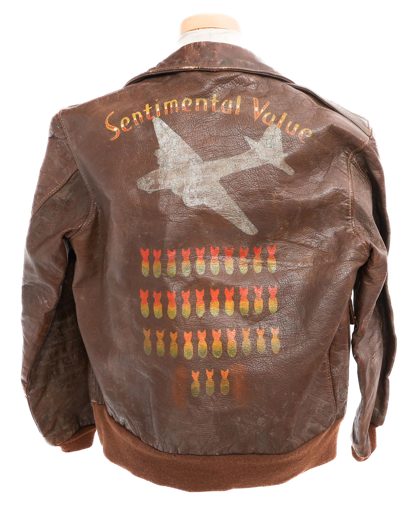 WWII USAAF BOMBER NAMED TYPE A-2 FLIGHT JACKET: WWII USAAF BOMBER NAMED TYPE A-2 FLIGHT JACKET WWII USAAF Bomber Type A-2 Flight Jacket. Named to Melvin C. Ringler, 35341416. Brown leather construction. Maker marked by Bronco Mfg. Co, tag present.