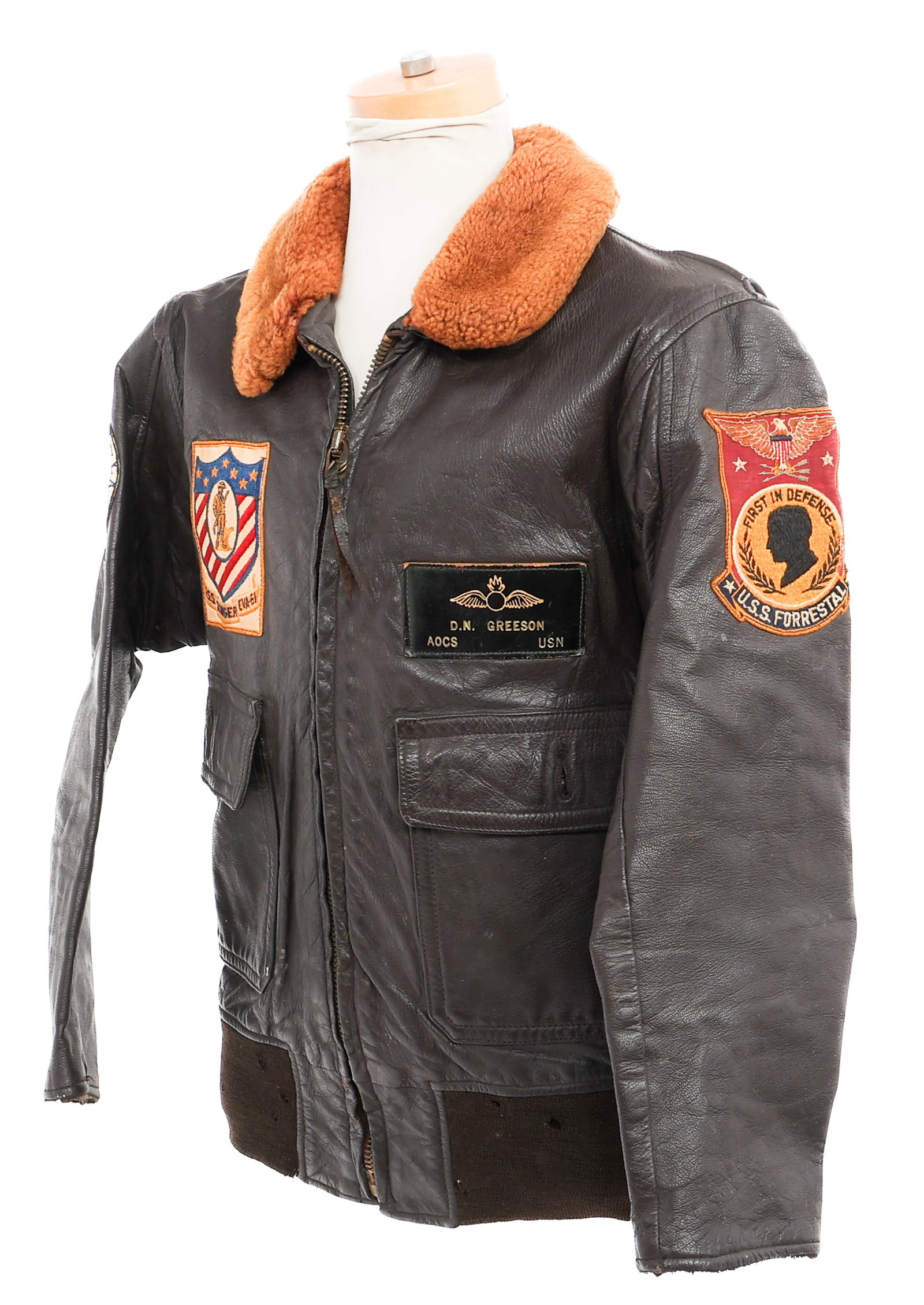 KOREAN WAR - VIETNAM WAR US NAVY G-1 FLIGHT JACKET: KOREAN WAR - VIETNAM WAR US NAVY G-1 FLIGHT JACKET Korean War - Vietnam War US Navy G-1 Leather Flight Jacket. US Aircraft Carrier patches on breast and sleeves. US Navy Aviation Ordnanceman name tag 