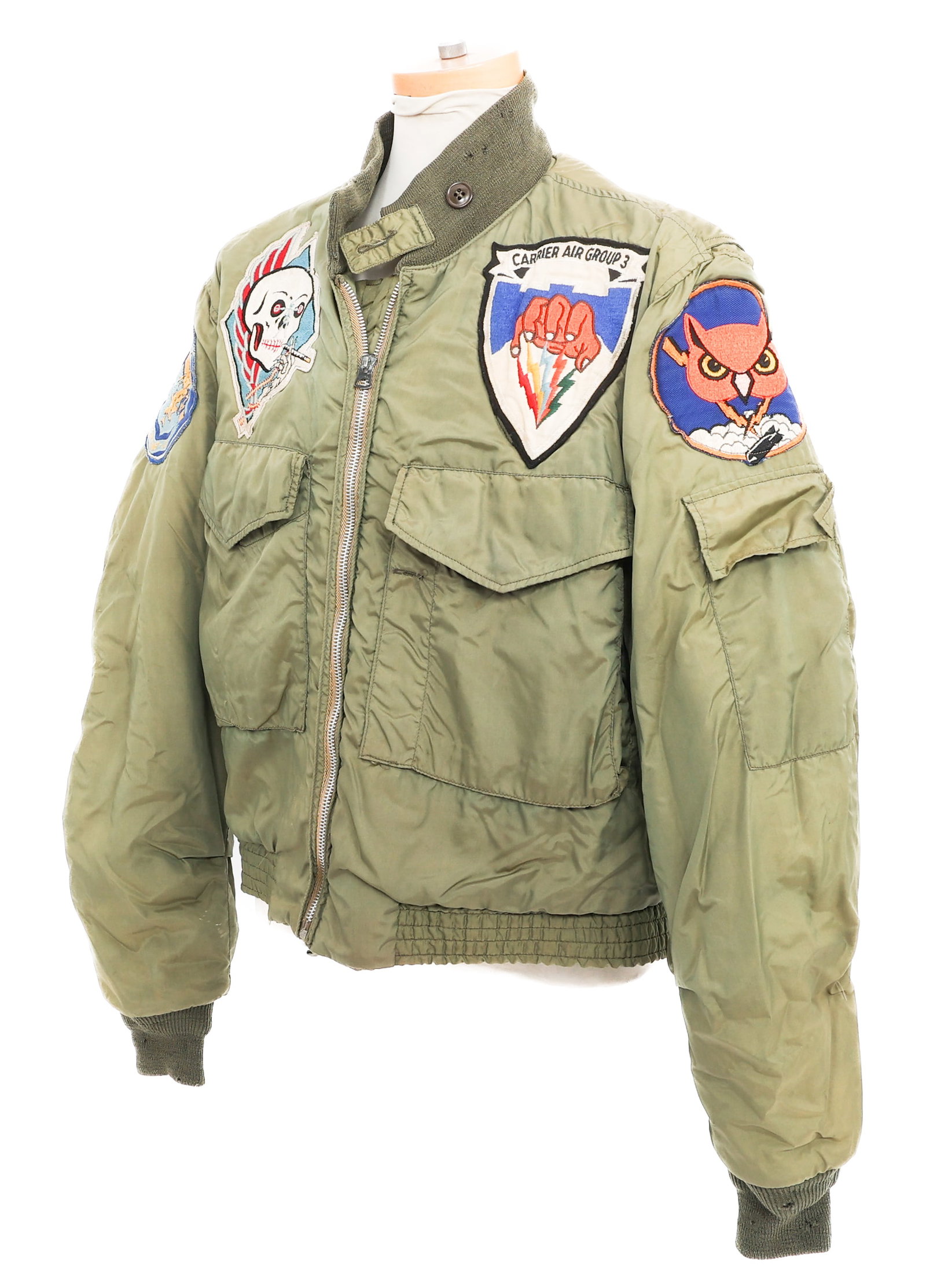 VIETNAM WAR USN OFFICER WEP WINTER FLIGHT JACKET: VIETNAM WAR USN OFFICER WEP WINTER FLIGHT JACKET Cold War US Navy Officer WEP Winter Flight Jacket. OD Green nylon construction. Zipper by Conmar. Tag present. Patches include VA-34, Carrier Air Group