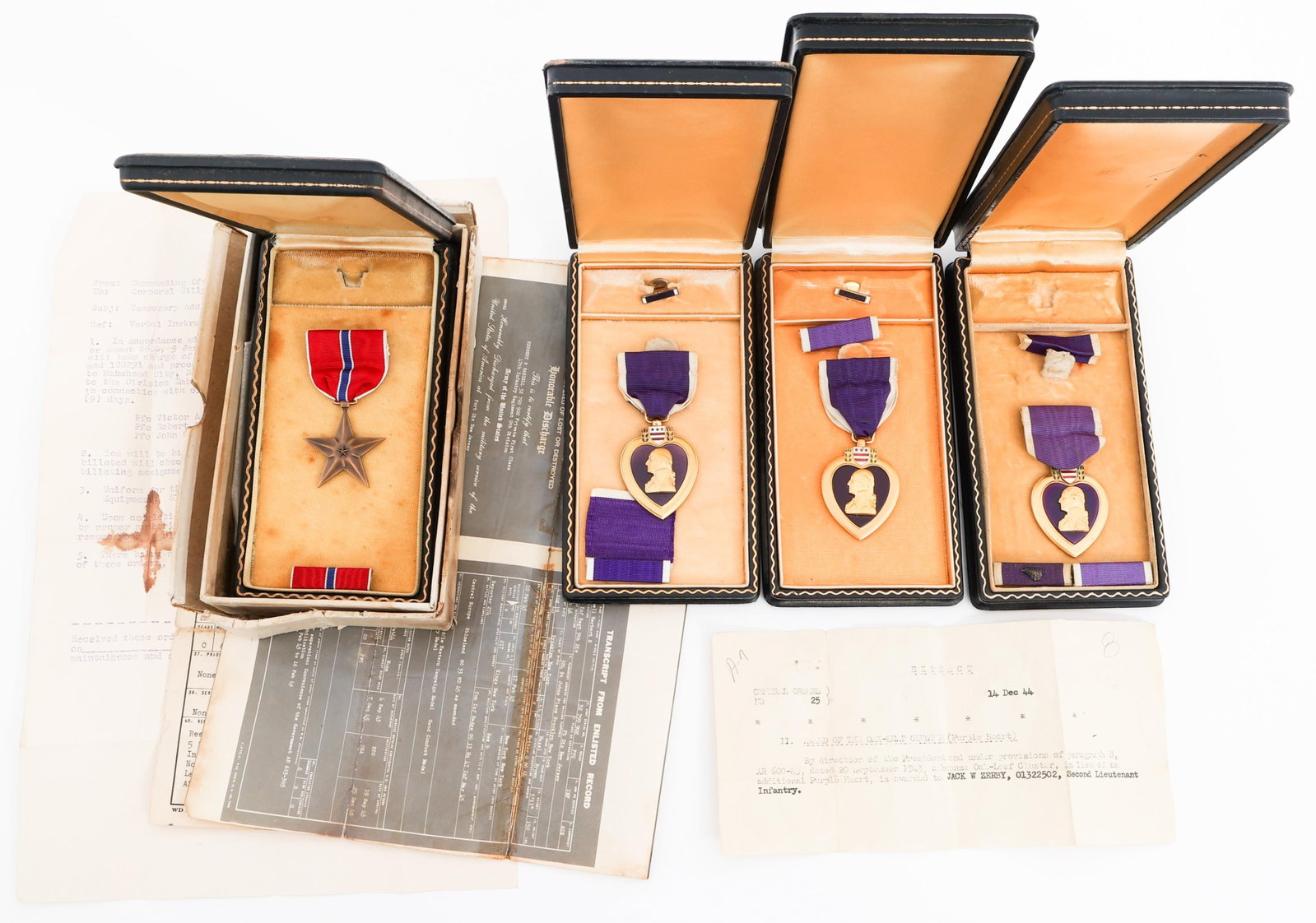 WWII US ARMED FORCES PURPLE HEARTS & BRONZE STAR: WWII US ARMED FORCES PURPLE HEARTS & BRONZE STAR WWII US Armed Forces Purple Heart and Bronze Star Medals. (1) Purple Heart. Attributed to 2nd Lieutenant Jack W. Zerby, O-1322502. Includes unnamed and