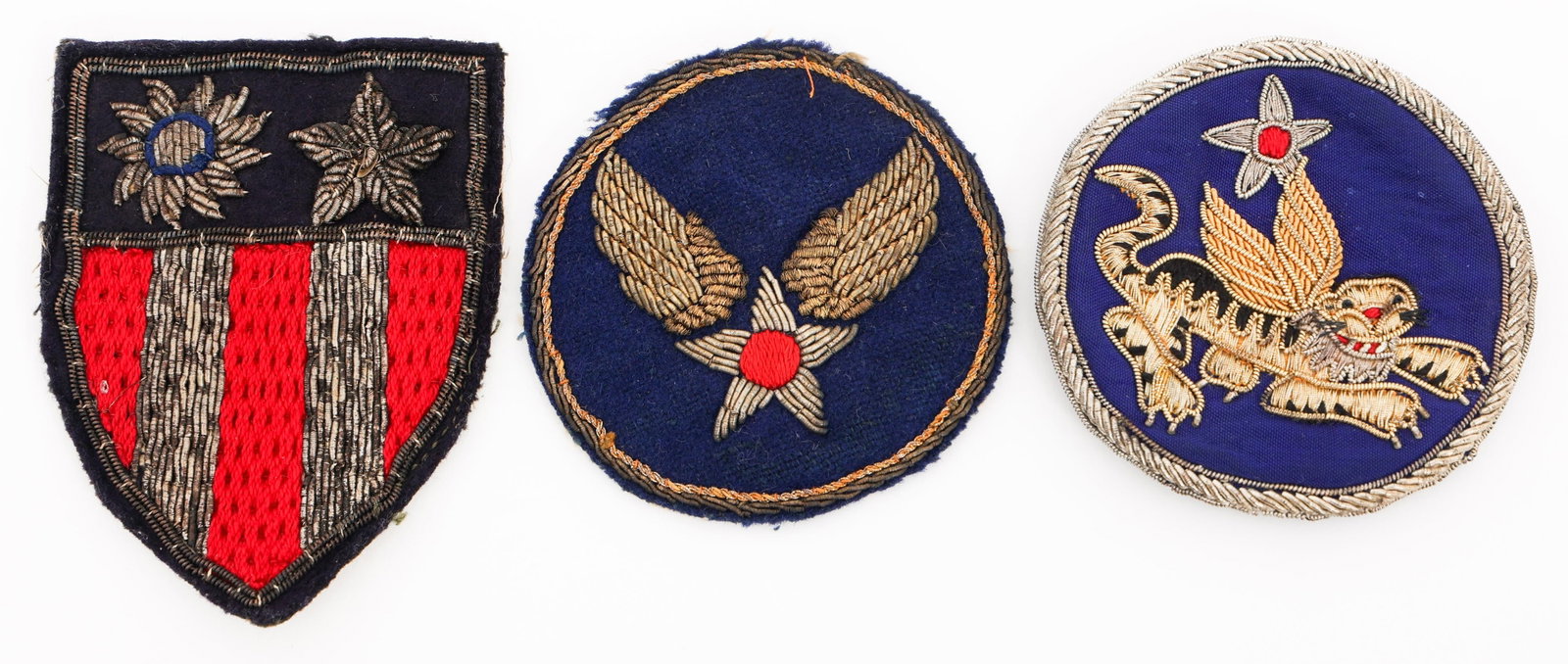 WWII USAAF CBI FLYING TIGERS THEATER MADE PATCHES: WWII USAAF CBI FLYING TIGERS THEATER MADE PATCHES WWII USAAF CBI 14th Air Force Flying Tigers Theater Made Patches. (1) 14th Air Force "Flying Tigers". Bullion embroidered on twill. (1) CBI Theater. B