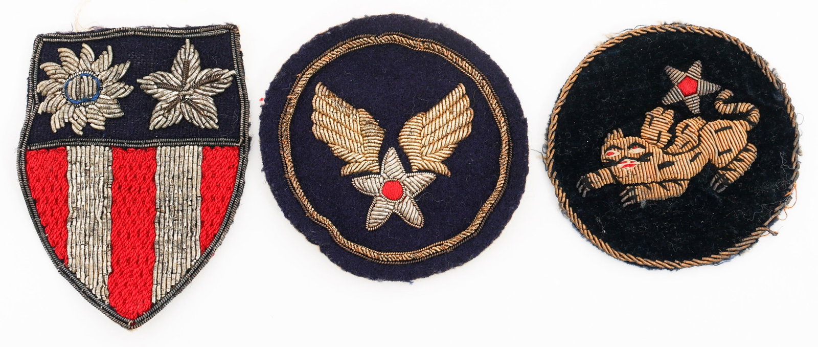 WWII USAAF CBI FLYING TIGERS THEATER MADE PATCHES: WWII USAAF CBI FLYING TIGERS THEATER MADE PATCHES WWII USAAF CBI 14th Air Force Flying "Tigers" Theater Made Patches. (1) 14th Air Force "Flying Tigers". Bullion embroidered on velvet. (1) CBI Theater