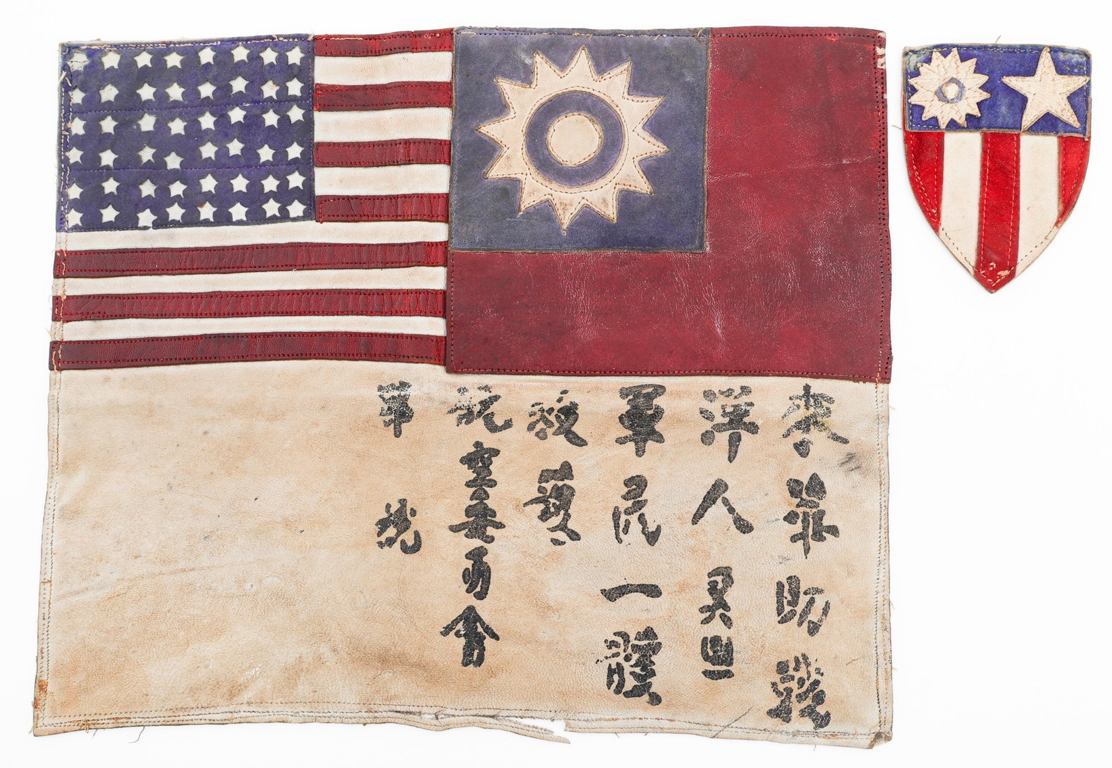 WWII USAAF CBI THEATER MADE BLOOD CHIT & PATCH: WWII USAAF CBI THEATER MADE BLOOD CHIT & PATCH WWII USAAF China-Burma-India Theater Made Leather Blood Chit & Shoulder Patch. (1) Leather CBI Blood Chit. Multi-piece leather construction. Chinese and 