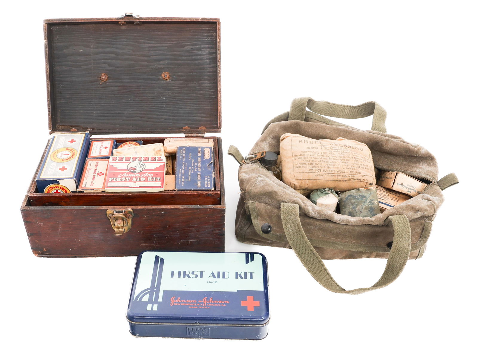 WWII US ARMED FORCES MEDIC FIRST AID KIT SUPPLIES: WWII US ARMED FORCES MEDIC FIRST AID KIT SUPPLIES WWII US Armed Forces Medic First Aid Kit Supplies. Includes Bandages, Gauze, Johnson & Johnson First Aid Kit, Field Dressings, Antiseptic Healing Oil,