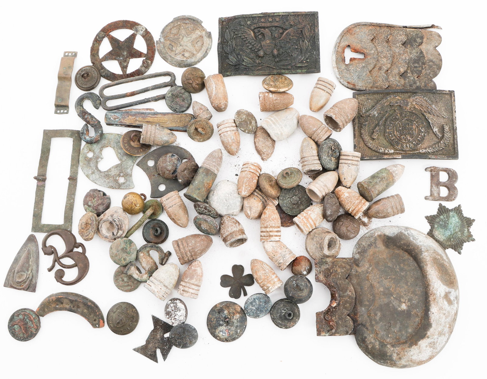 CIVIL WAR ERA DUG RELIC MUNITIONS & BELT BUCKLES: CIVIL WAR ERA DUG RELIC MUNITIONS & BELT BUCKLES Civil War Era Dug Relic Bullets, Musket Balls, Insignia, Belt Buckles, Buttons and more. Provenance: Lifetime Military Memorabilia & Arms Collection of