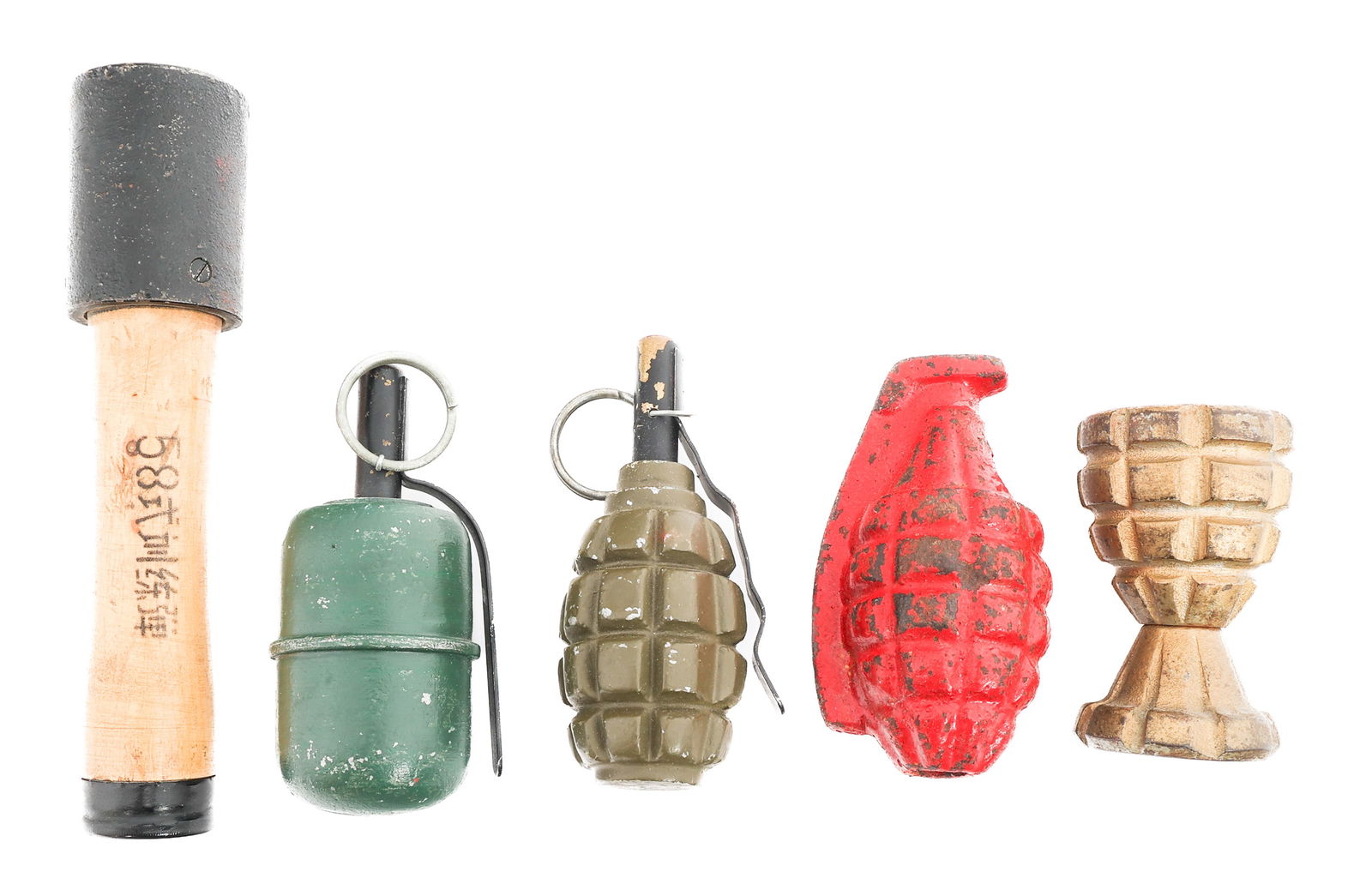 COLD WAR WORLD MILITARY GRENADES: COLD WAR WORLD MILITARY GRENADES Cold War World Military Grenades and Ordnance. (1) Russian F-1 Grenade. (1) Chinese Type 67 Training Hand Grenade. (1) MK 2 Pineapple grenade converted to egg holder.