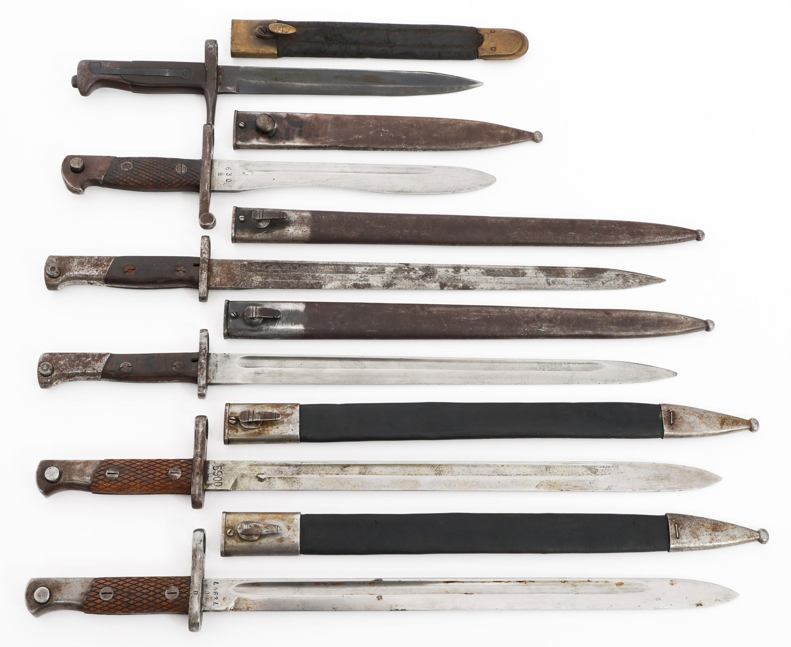 ITALIAN, SPANISH M1913, M1941 & MAUSER BAYONETS: ITALIAN, SPANISH M1913, M1941 & MAUSER BAYONETS Italian Vetterli, Spanish M1913, M1941 and Mauser Bayonets. (1) Cut down Italian Vetterli Rifle Bayonet. Quillon has been removed. Leather scabbard with