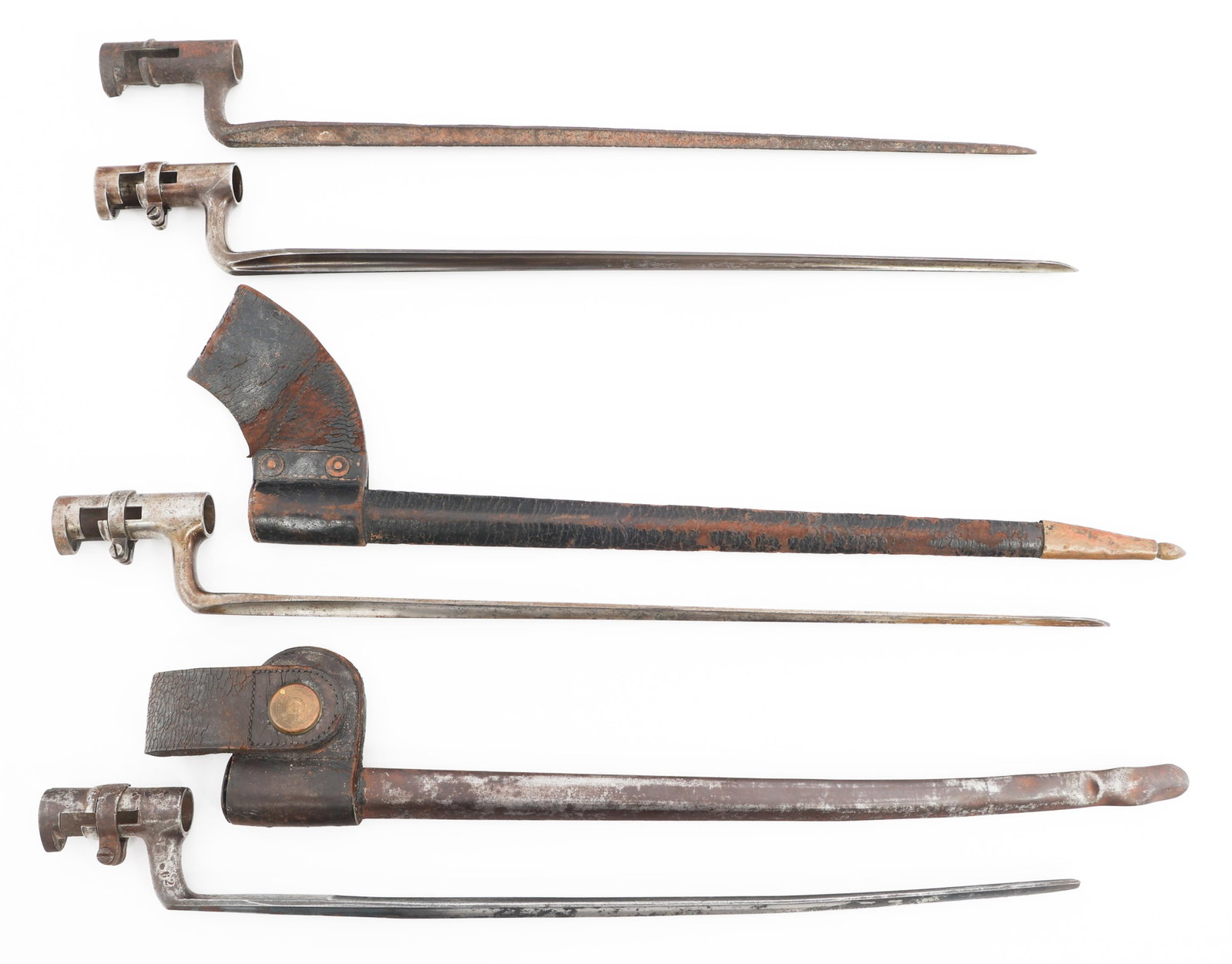 US M1873 SOCKET BAYONETS: US M1873 SOCKET BAYONETS US M1873 Socket Bayonets. (4) Triangular blades. Some are marked "US". Two have sheaths/scabbards. Provenance: Lifetime Military Memorabilia & Arms Collection of Peter L. Knep
