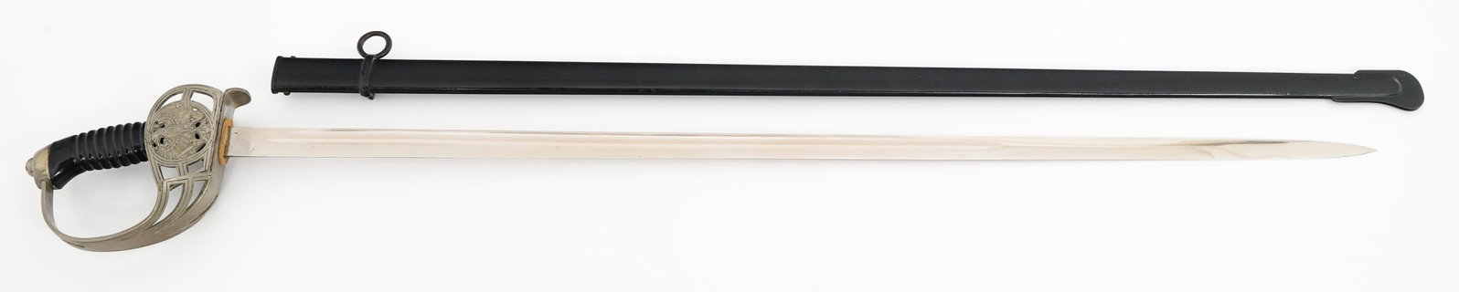 IMPERIAL GERMAN M1889 CAVALRY TROOPER SWORD: IMPERIAL GERMAN M1889 CAVALRY TROOPER SWORD Imperial German M1889 Cavalry Trooper Sword. Single edged, bright blade with fuller. Maker marked by Carl Eickhorn. Felt buffer pad present. Nickel-Silver h